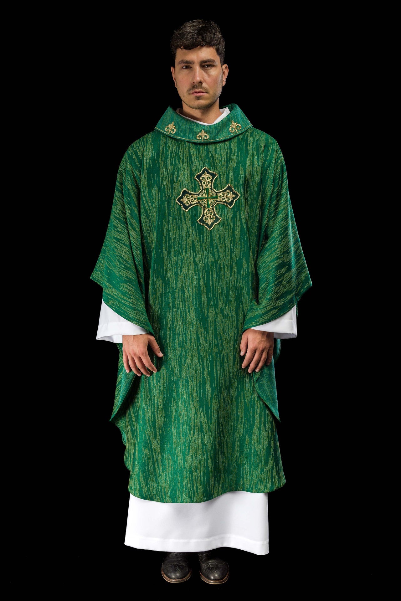 Green chasuble with richly embroidered cross and decorated collar