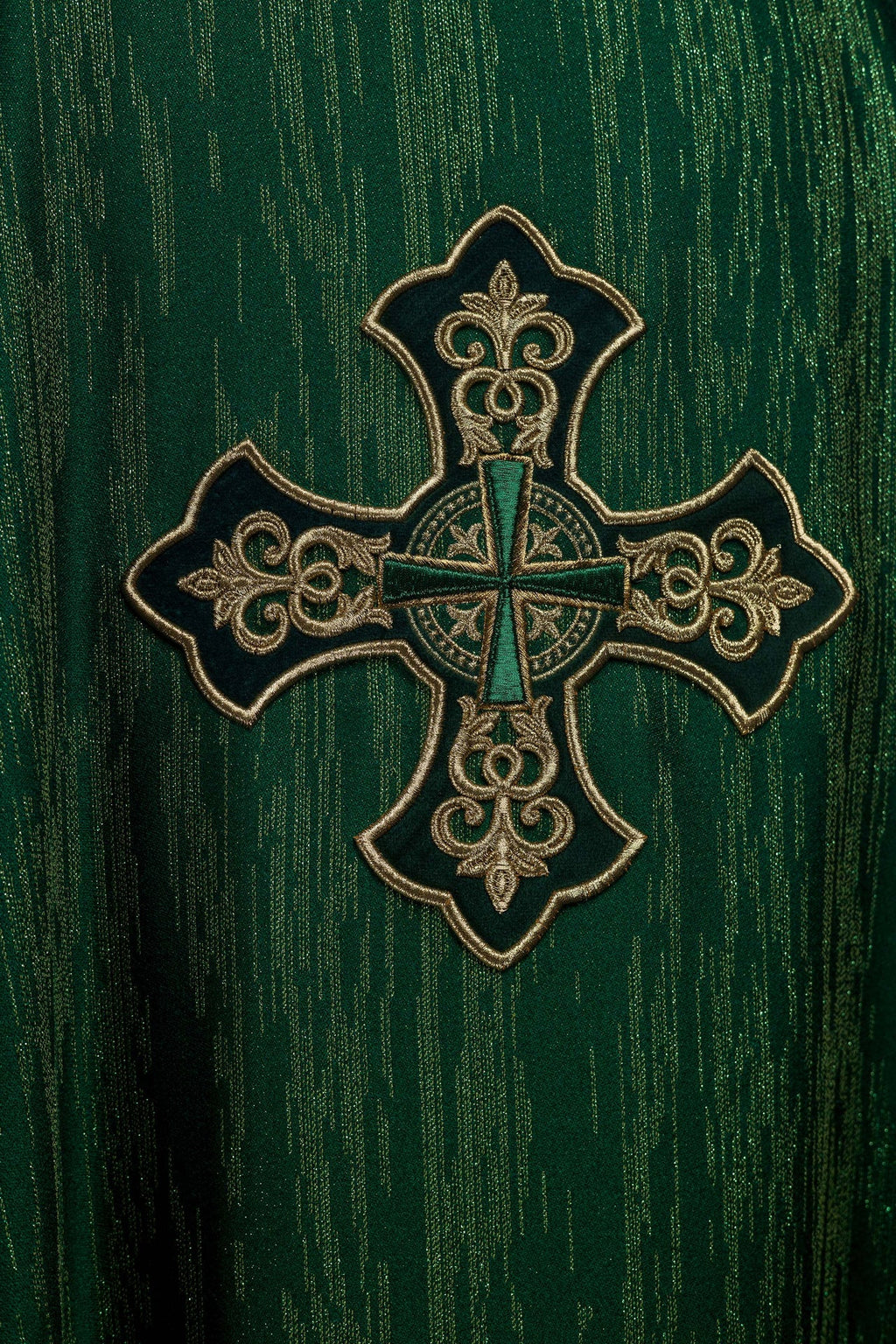 Green chasuble with richly embroidered cross and decorated collar