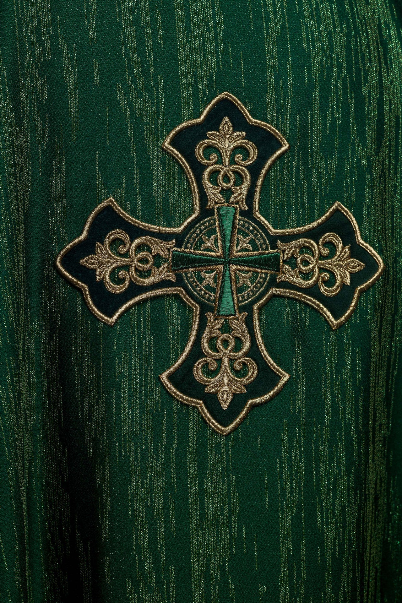 Green chasuble with richly embroidered cross and decorated collar