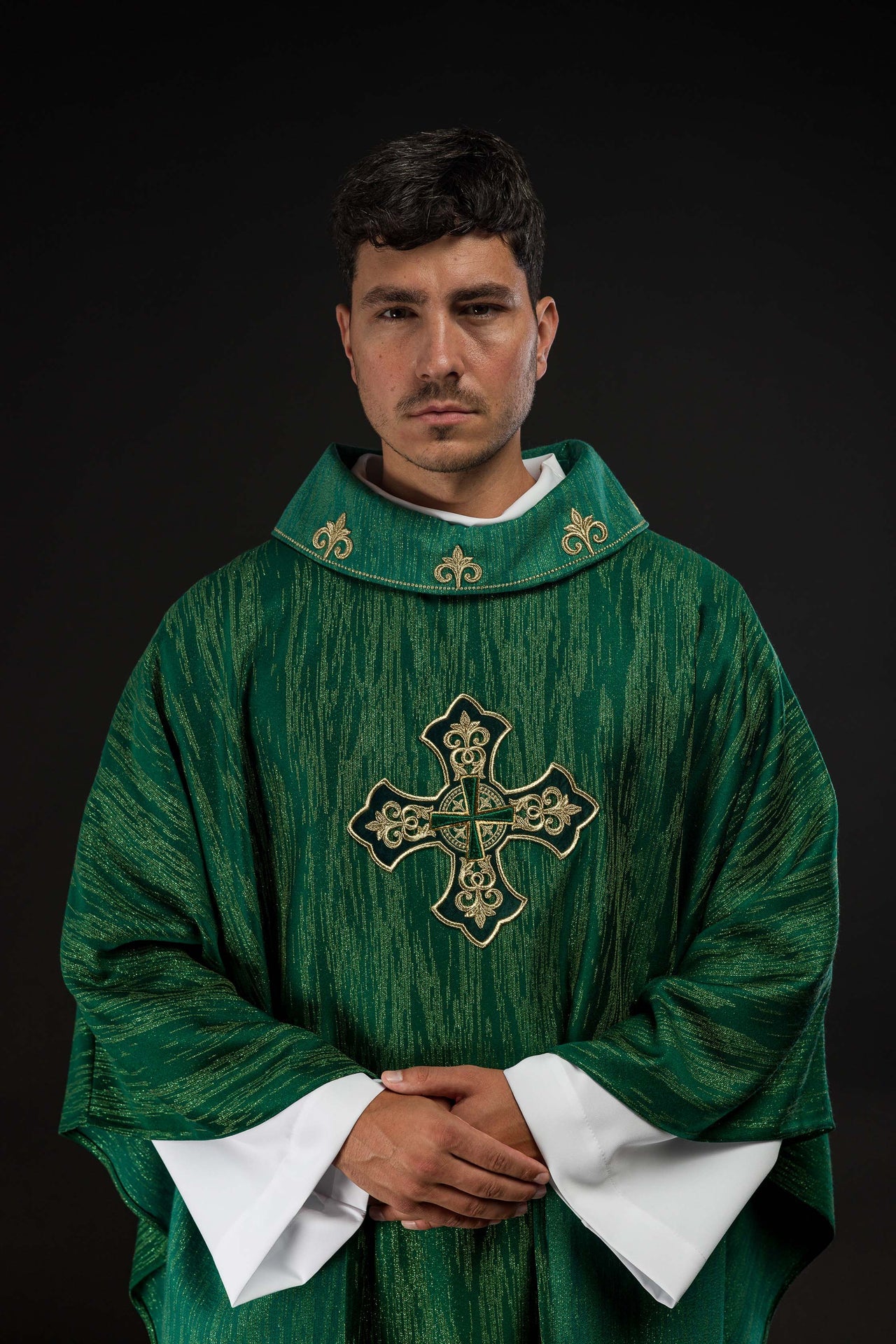 Green chasuble with richly embroidered cross and decorated collar