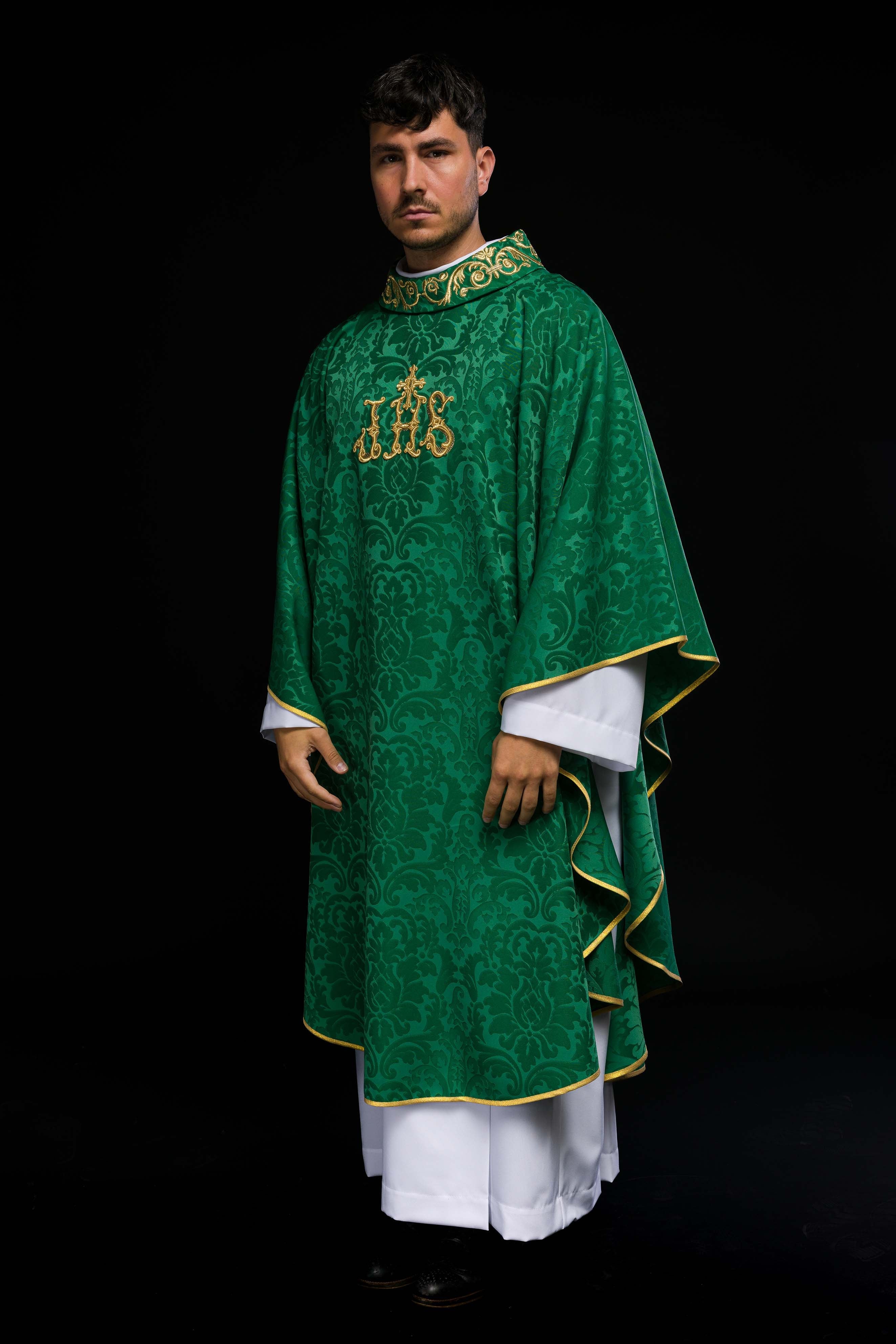 Green chasuble with IHS motif and richly embroidered collar on decorative fabric