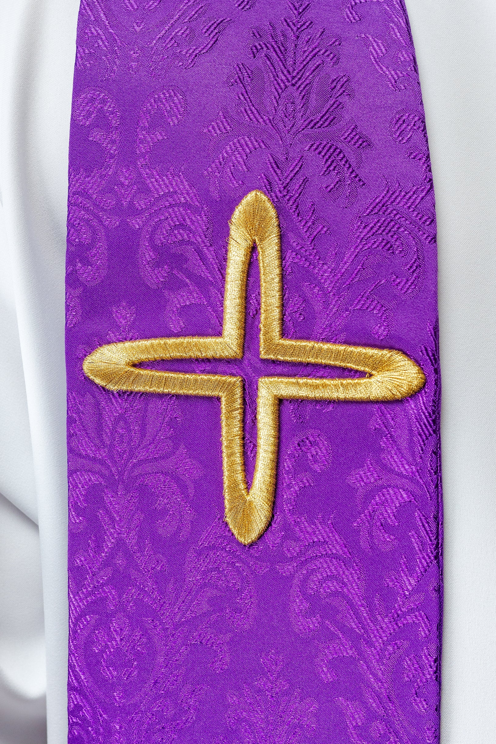 Embroidered jacquard stole with cross motifs purple