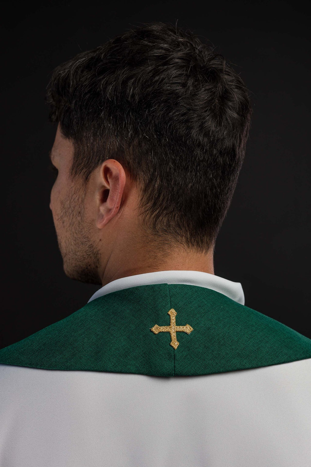Green stole embroidered with the IHS motif