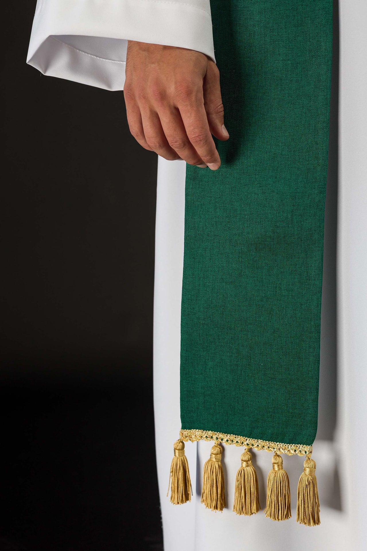 Green stole embroidered with the IHS motif