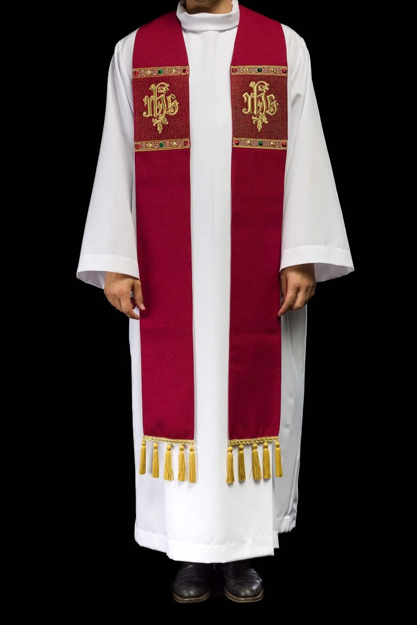 Red stole embroidered with the IHS motif