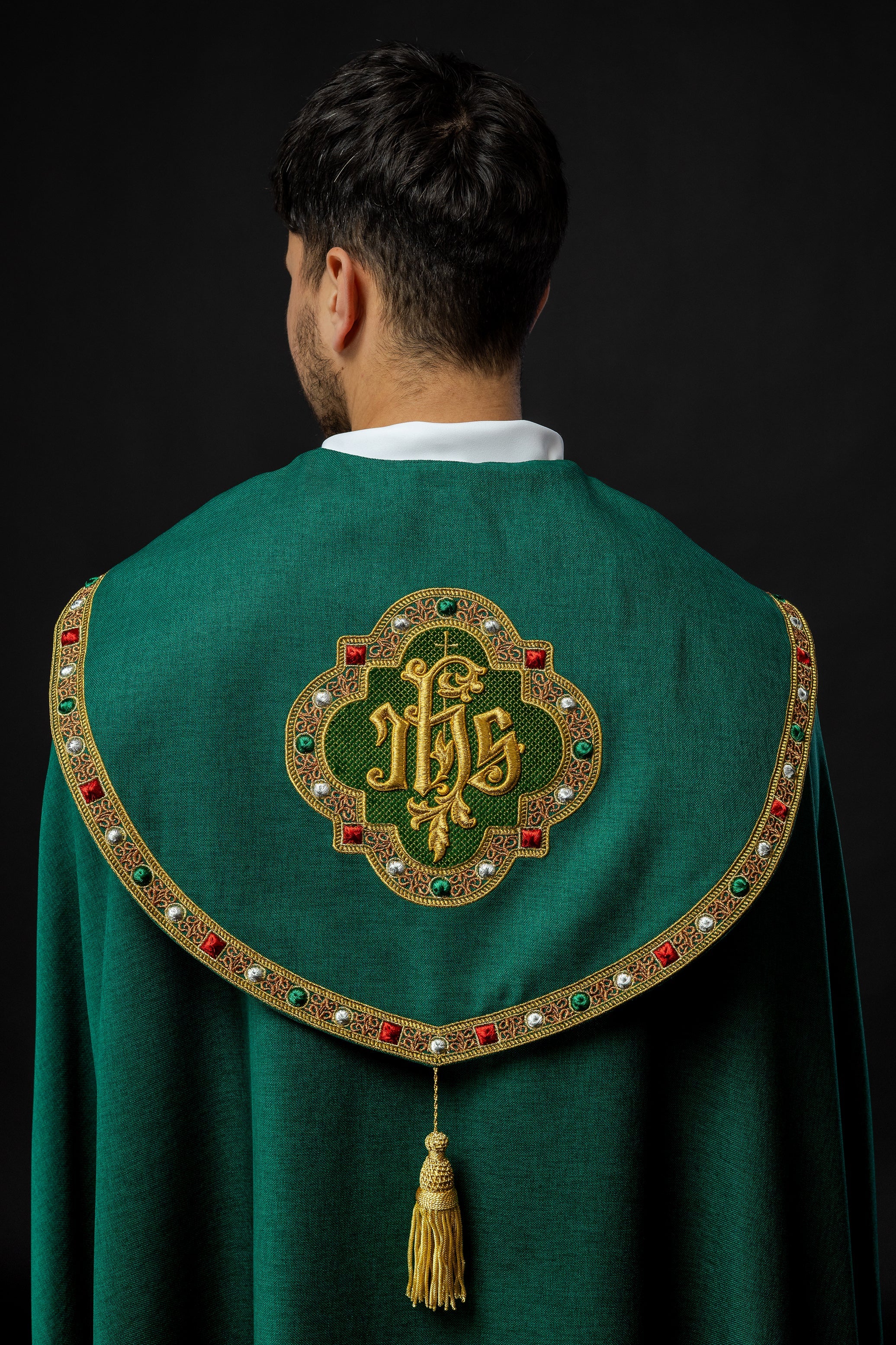 Green liturgical cape with gold IHS