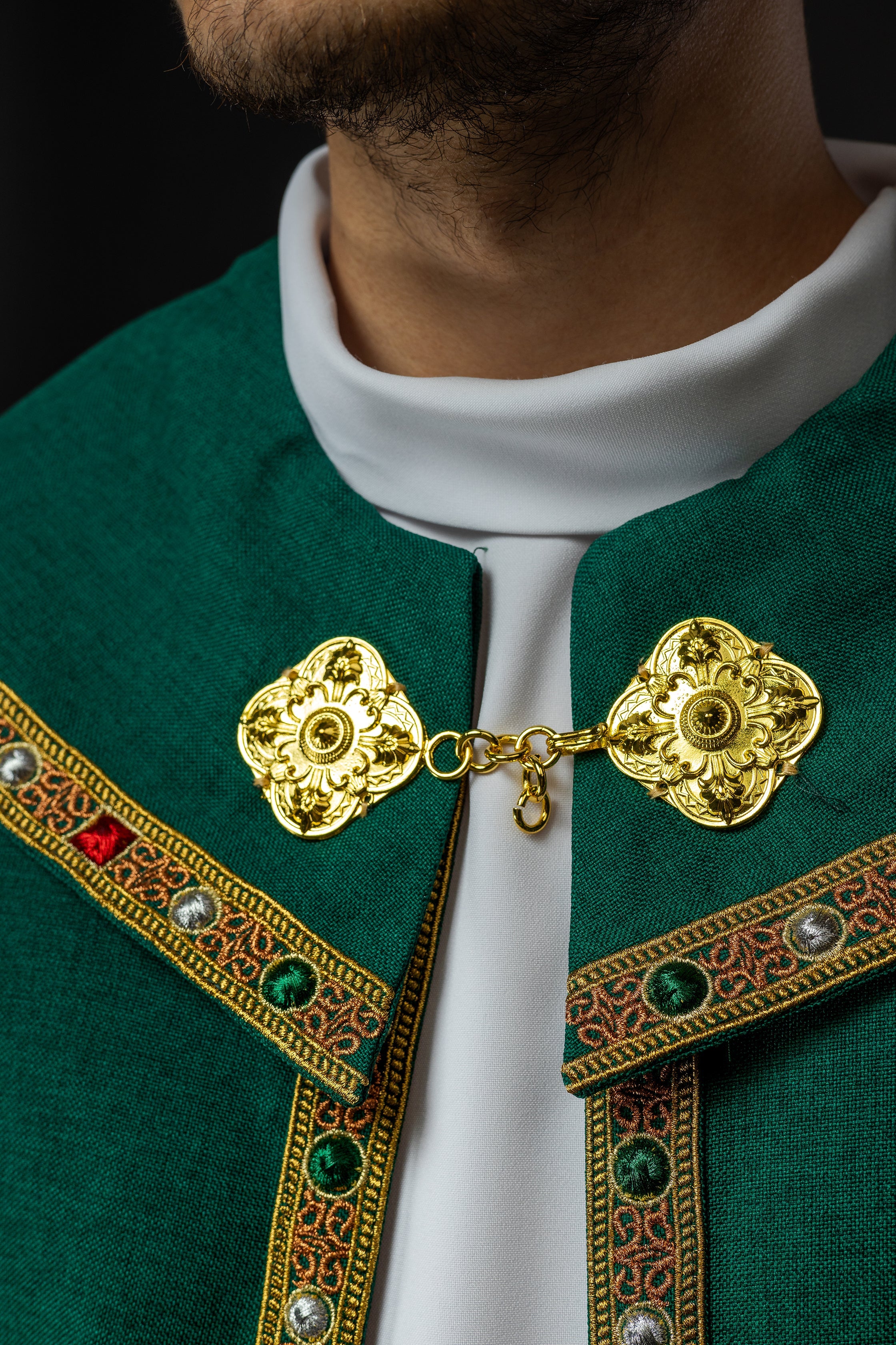 Green liturgical cape with gold IHS