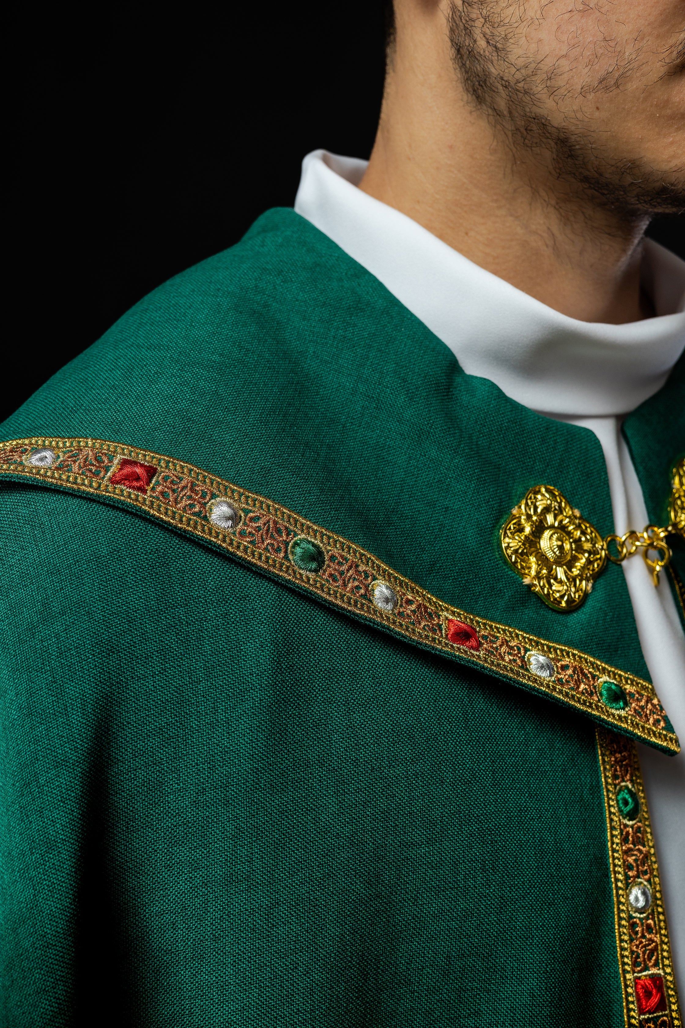 Green liturgical cape with gold IHS