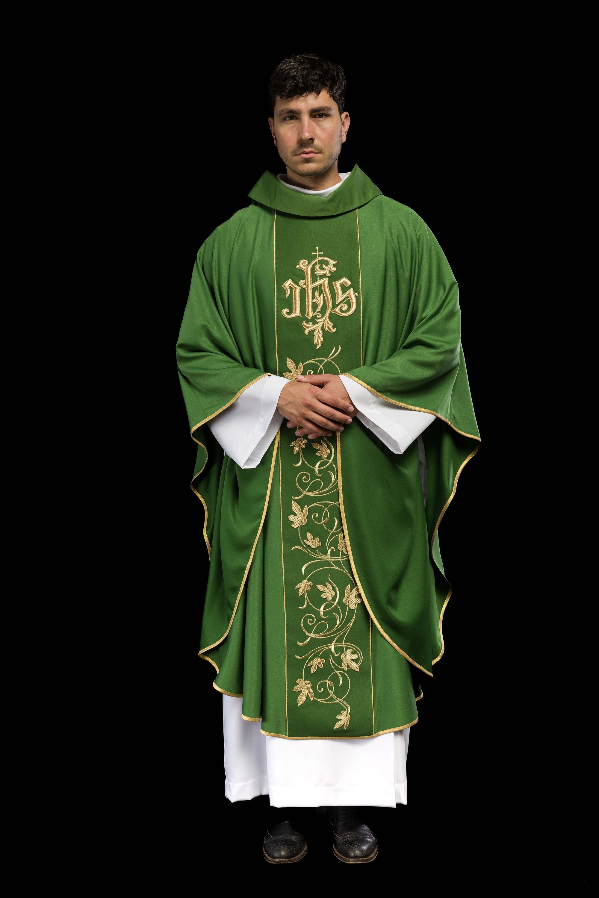 Green liturgical chasuble with richly decorated belt with floral motif and IHS