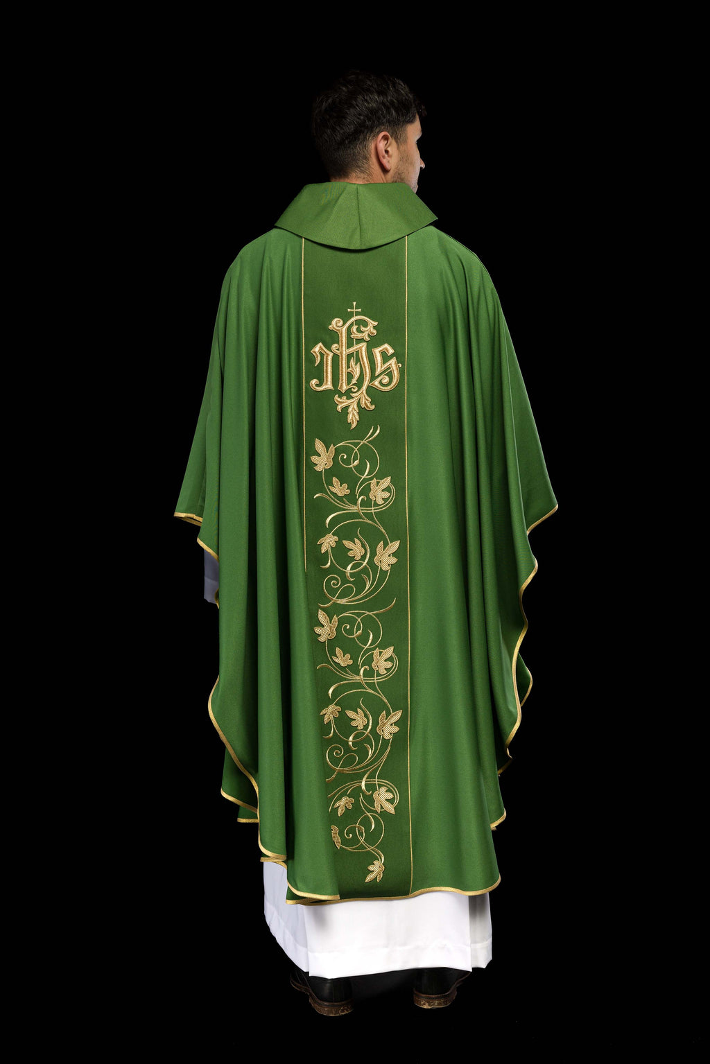 Green liturgical chasuble with richly decorated belt with floral motif and IHS