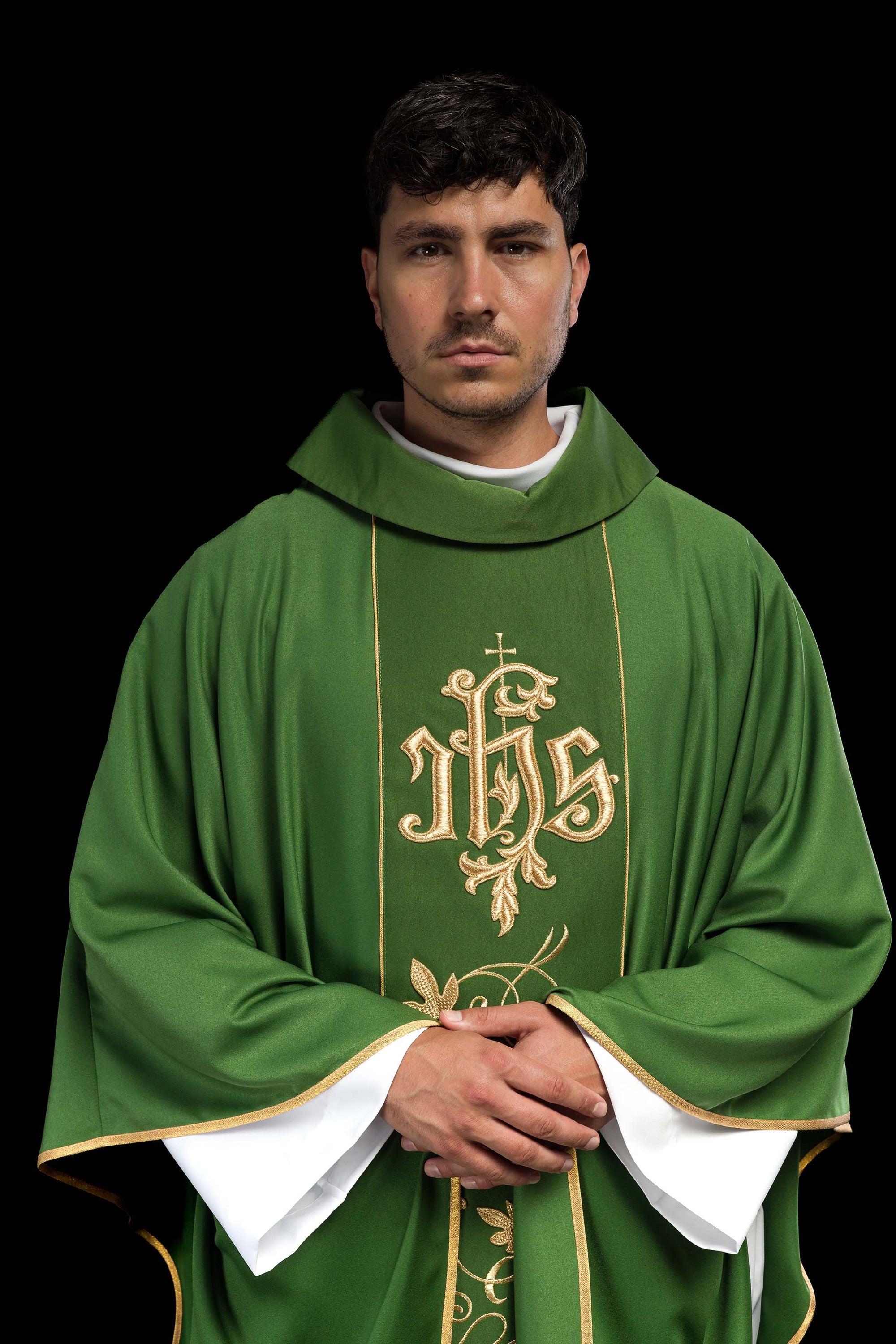 Green liturgical chasuble with richly decorated belt with floral motif and IHS