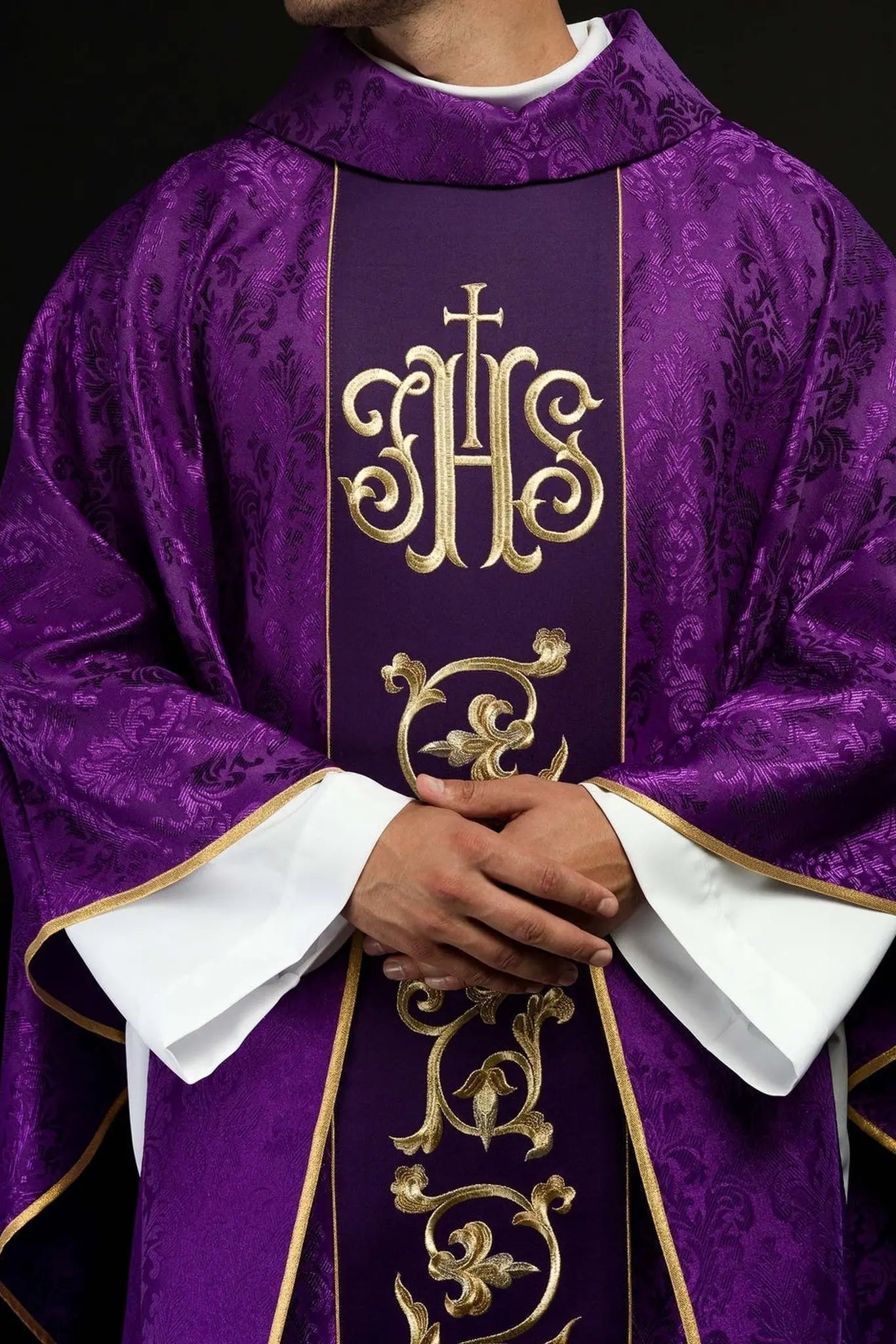 Purple liturgical chasuble with richly decorated IHS belt