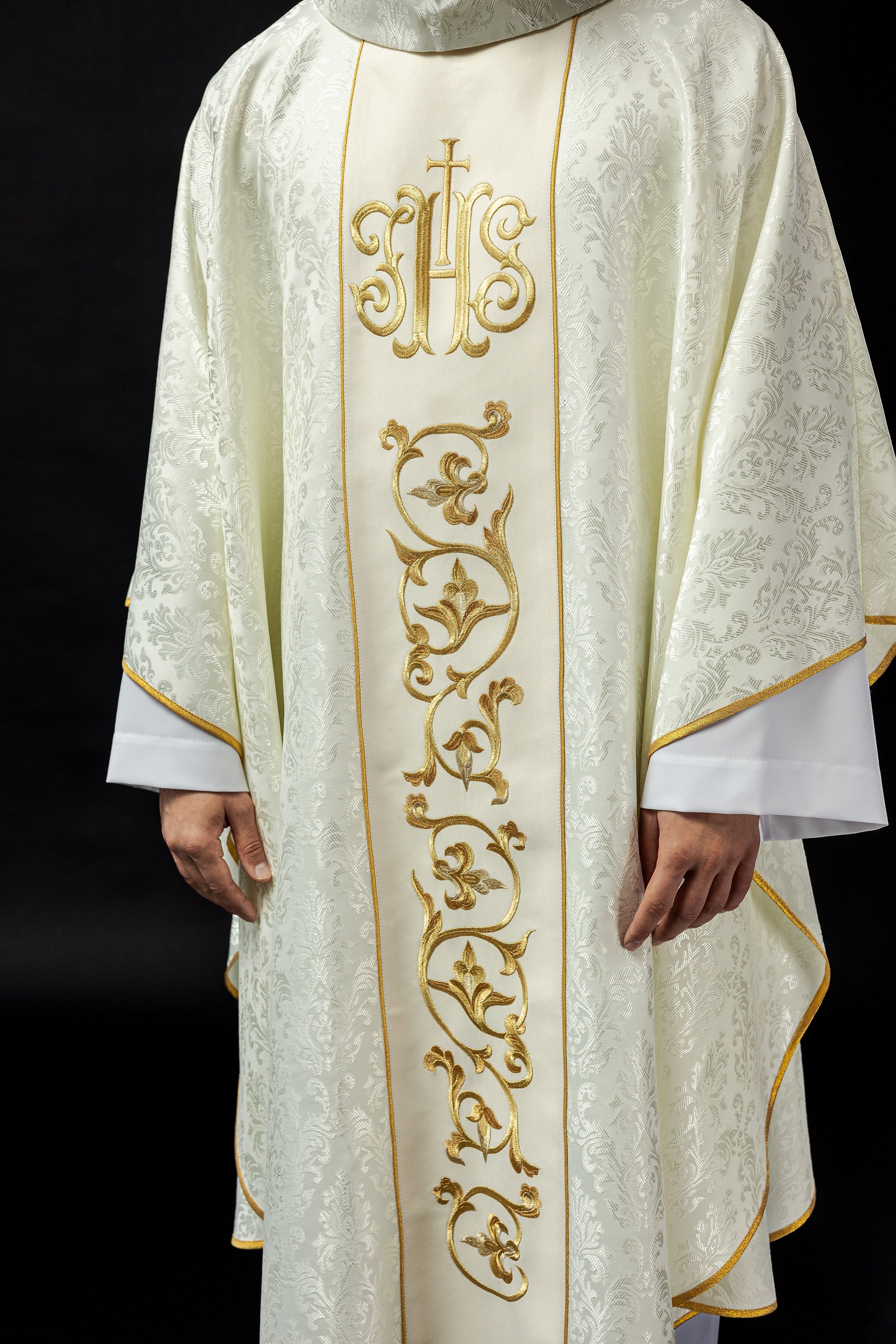 Ecru liturgical chasuble with richly decorated IHS belt