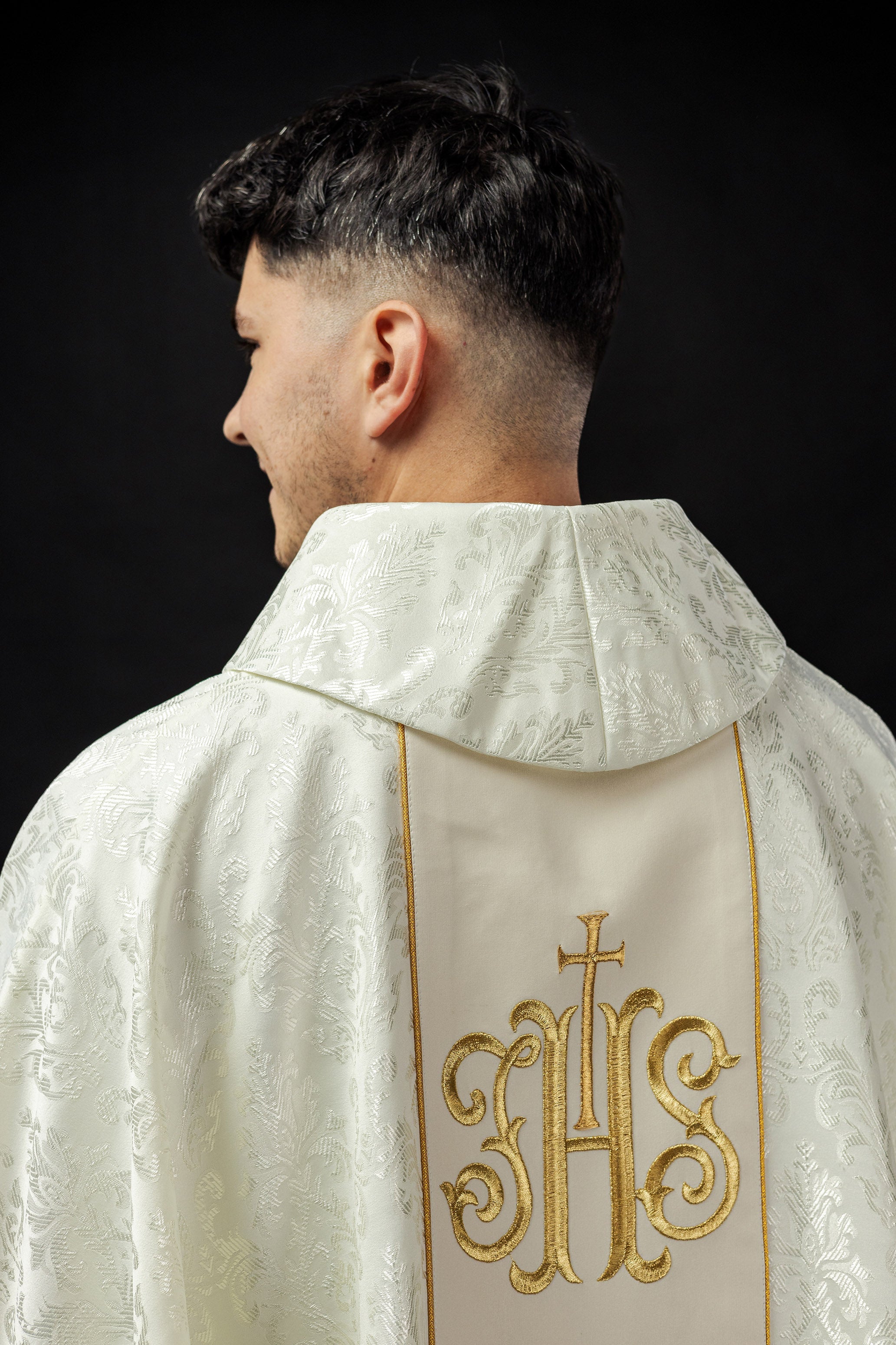 Ecru liturgical chasuble with richly decorated IHS belt