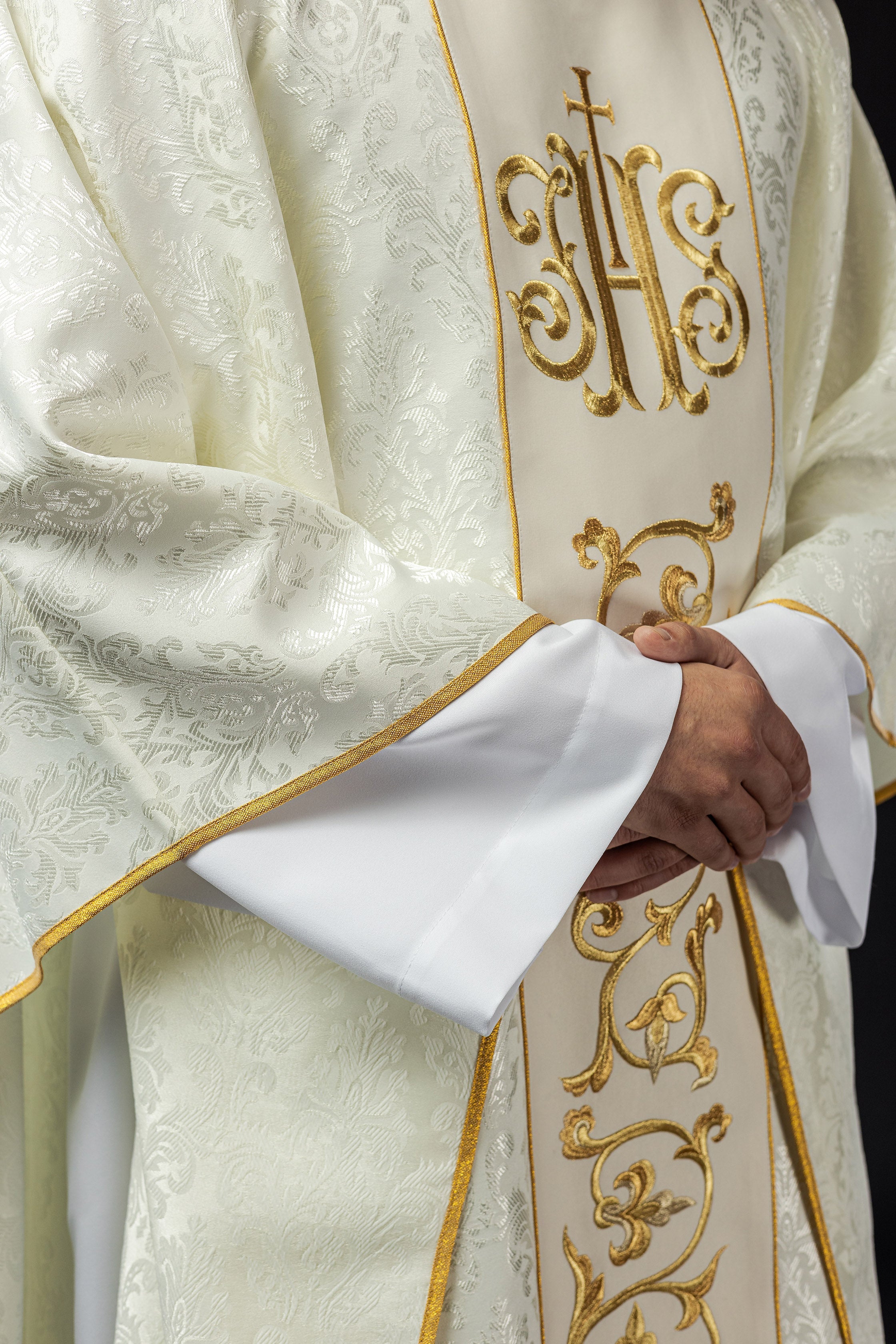 Ecru liturgical chasuble with richly decorated IHS belt