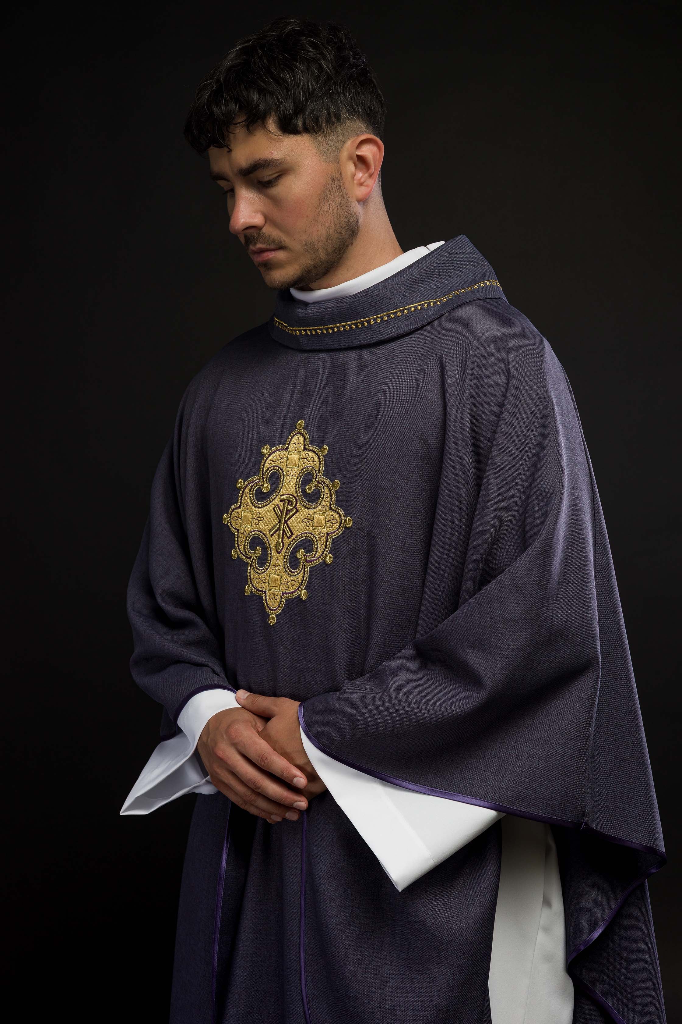 Chasuble with embroidered cross and gold trim on the collar in purple