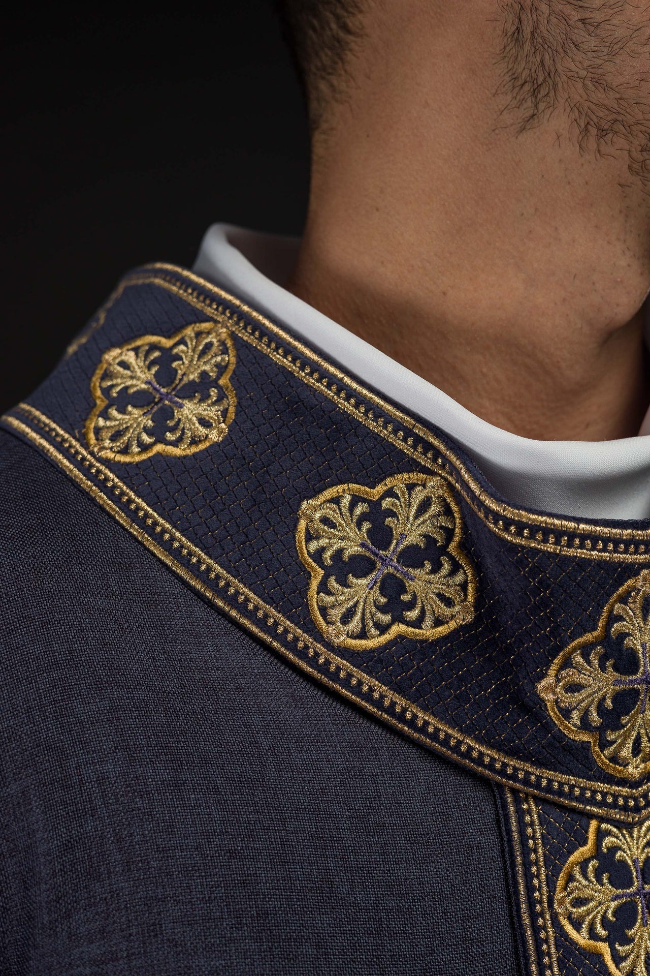 Purple chasuble with embroidered belt and cross collar