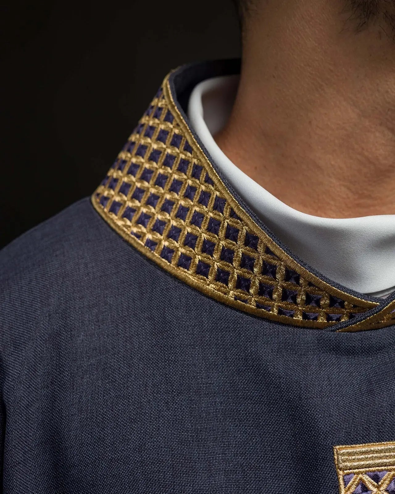 Purple chasuble with embroidered crosses and collar