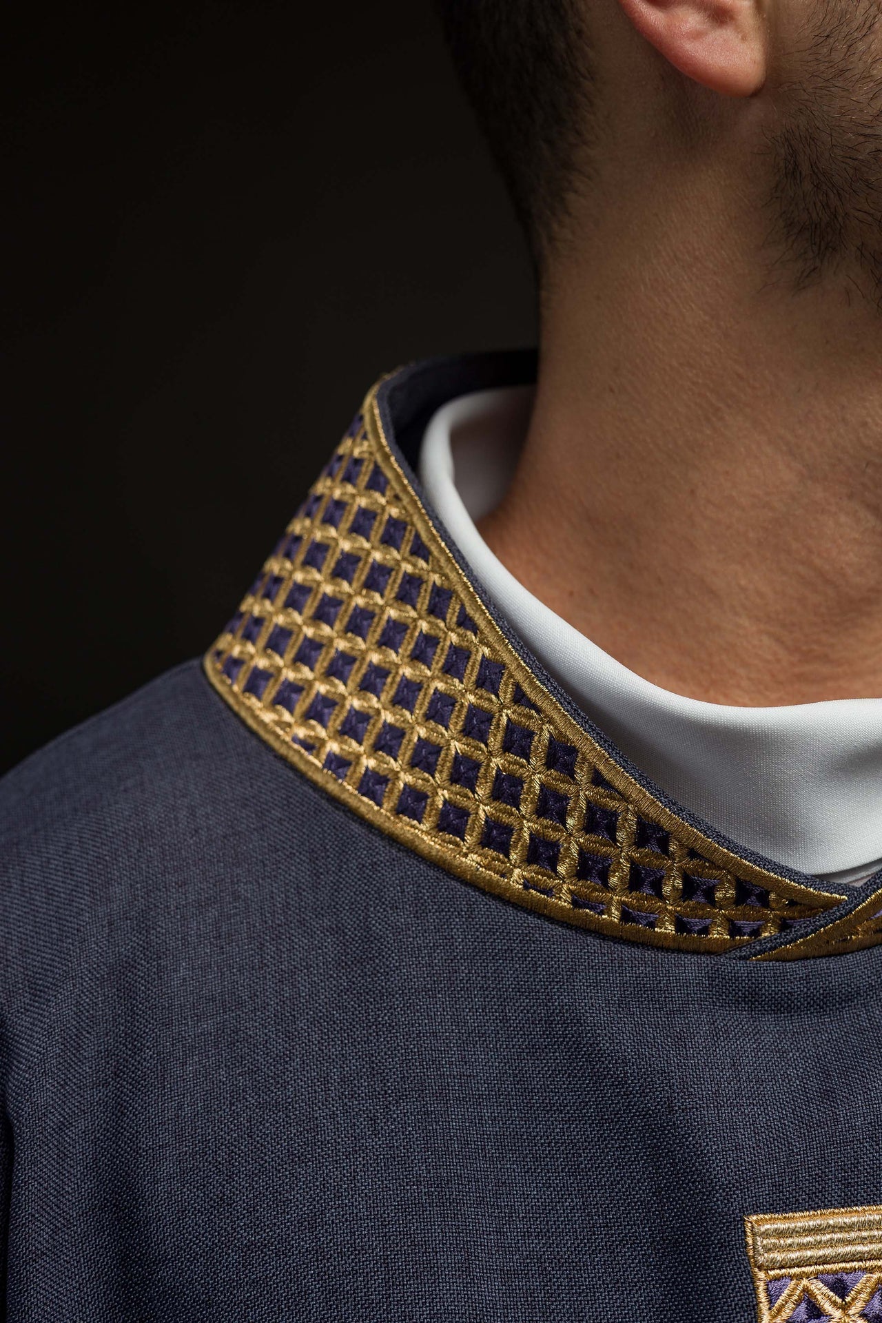 Purple chasuble with embroidered crosses and collar