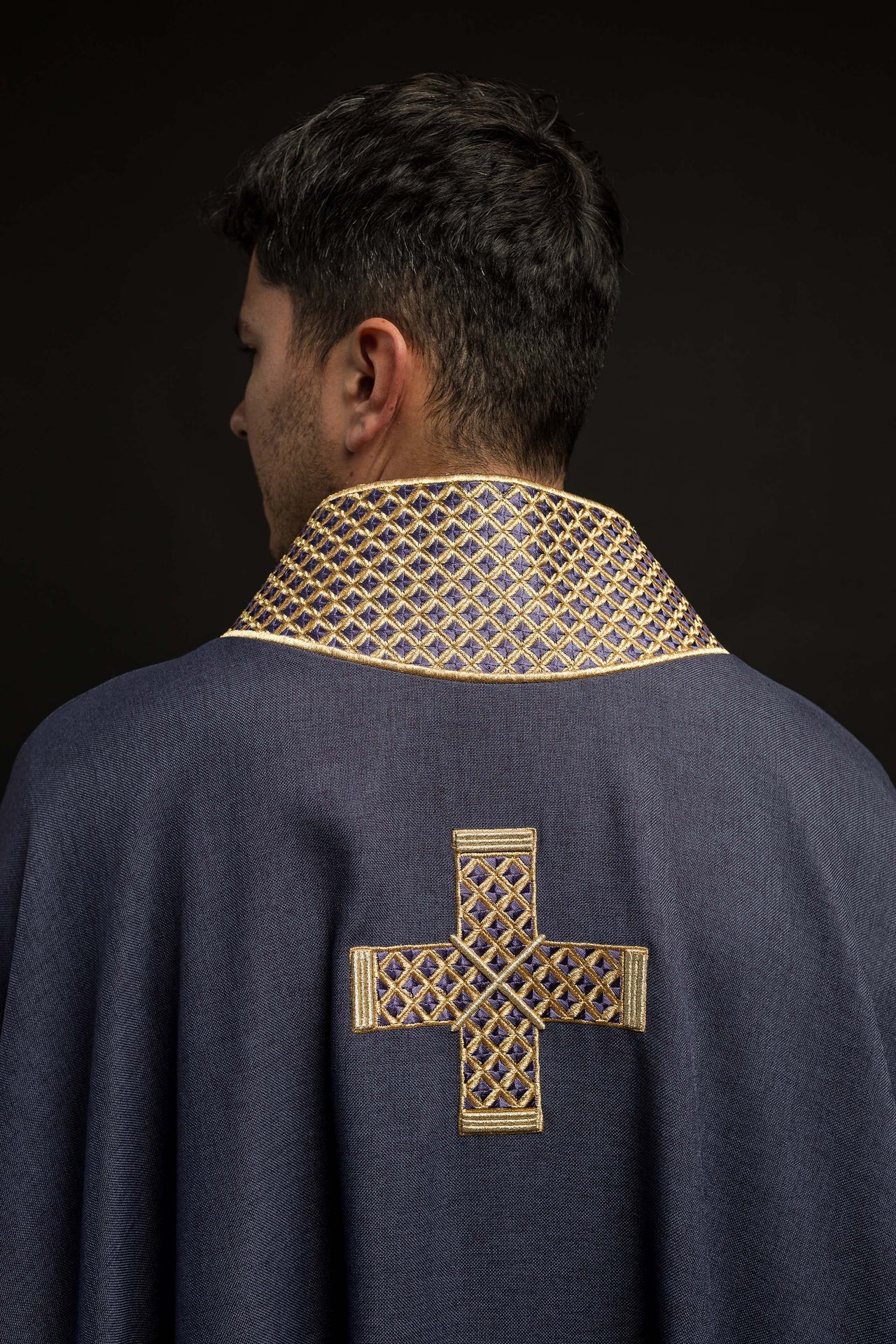 Purple chasuble with embroidered crosses and collar