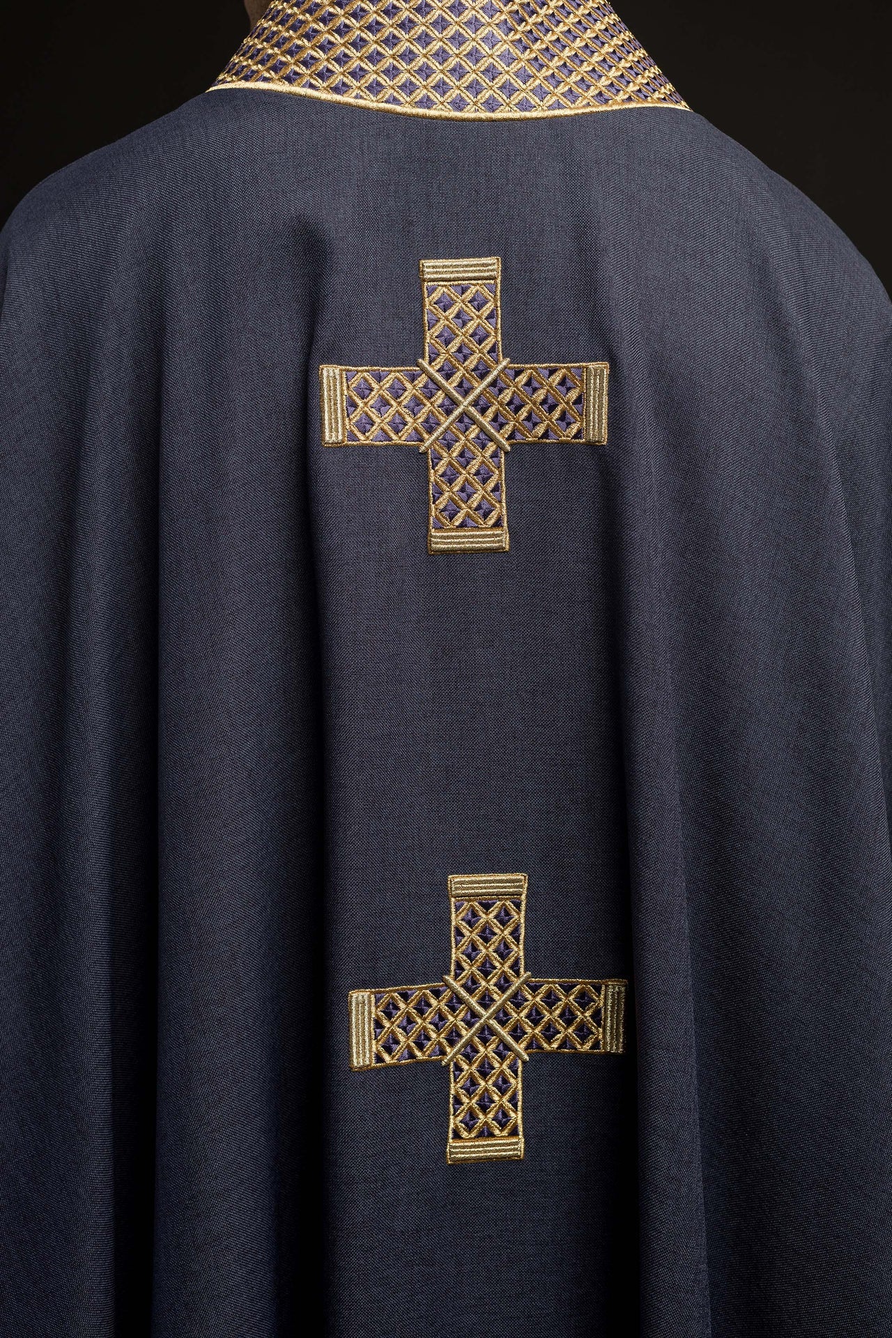 Purple chasuble with embroidered crosses and collar