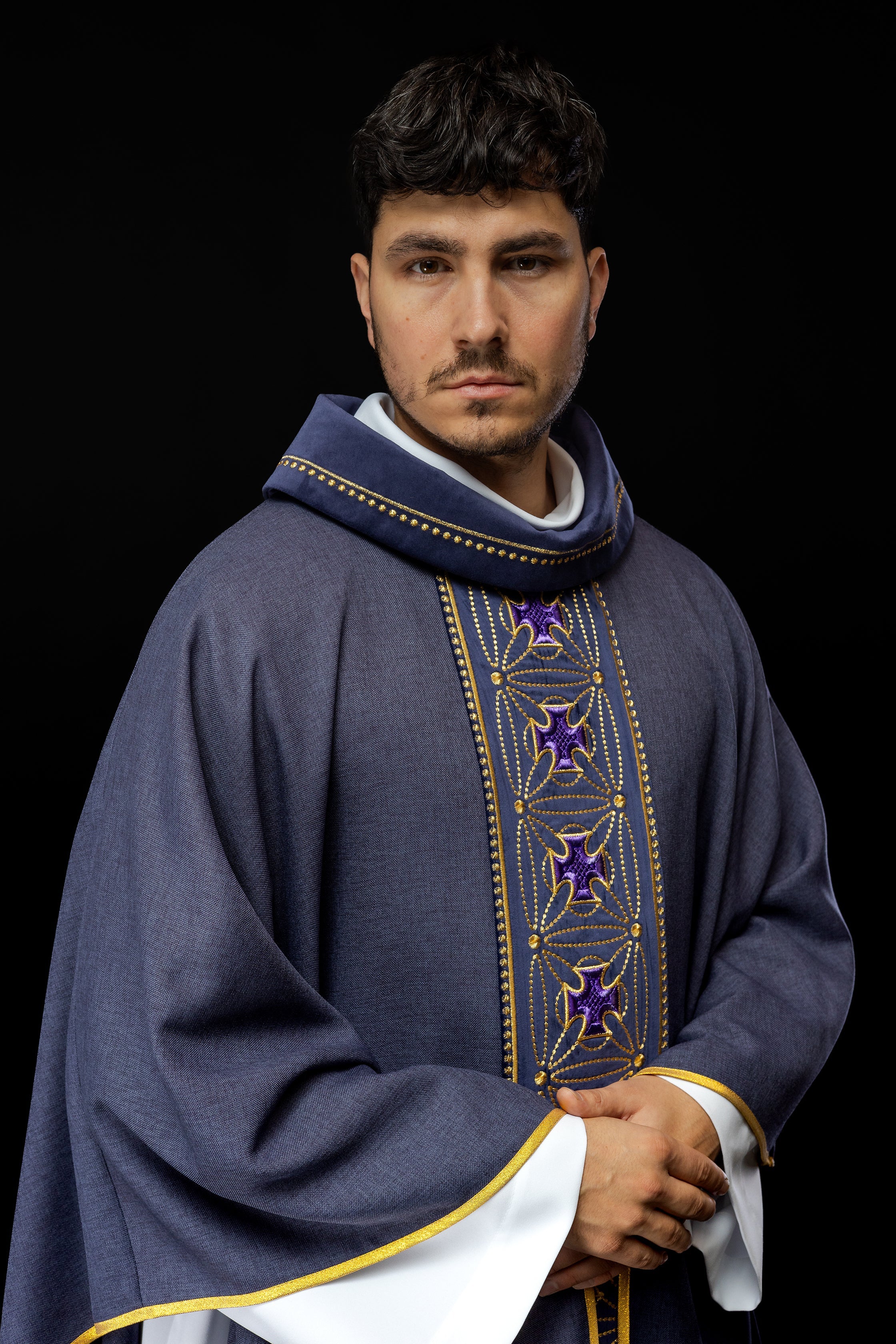 Liturgical chasuble with richly decorated belt with crosses in purple color