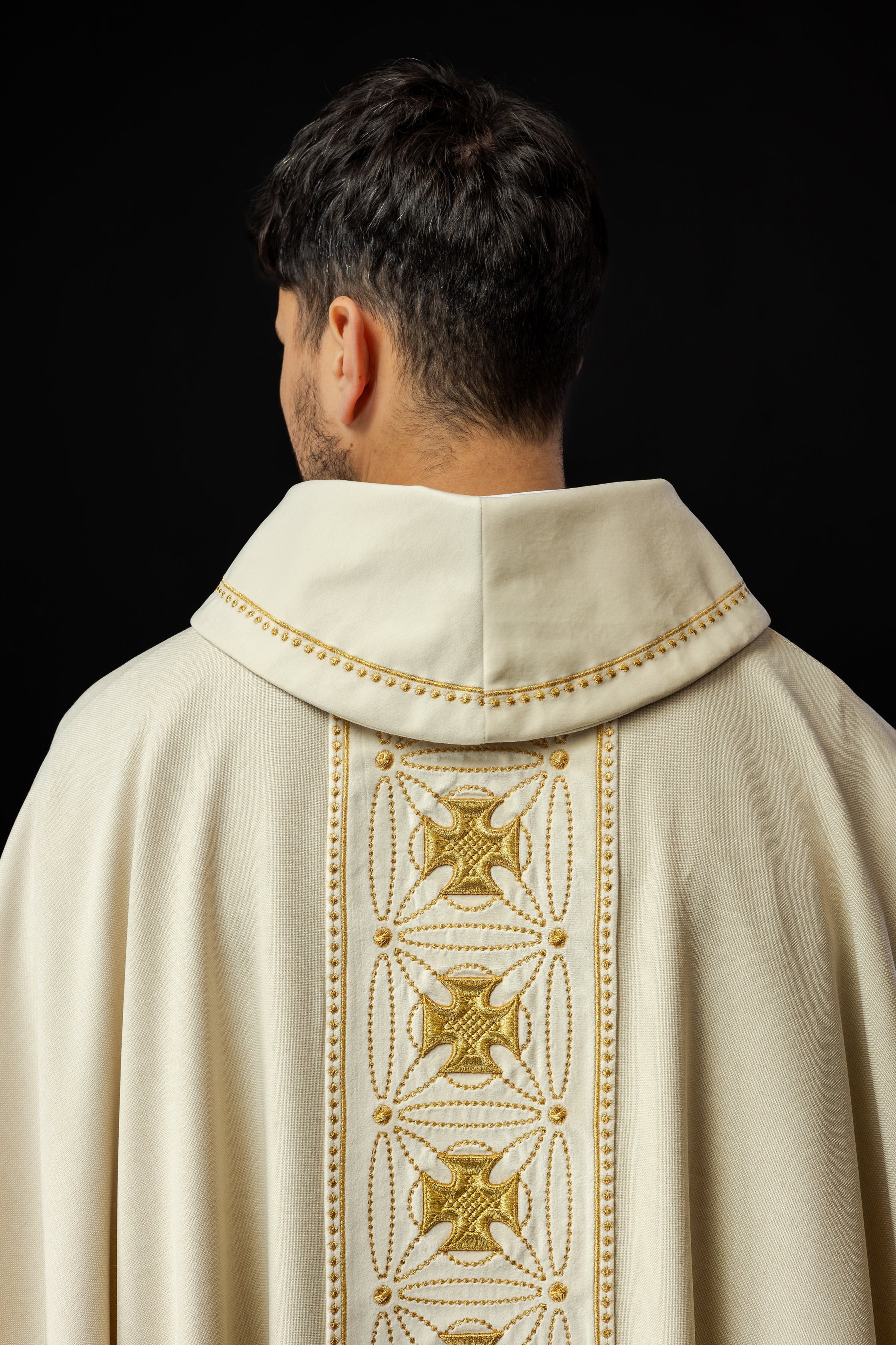 Liturgical chasuble with richly decorated belt with crosses in ecru color