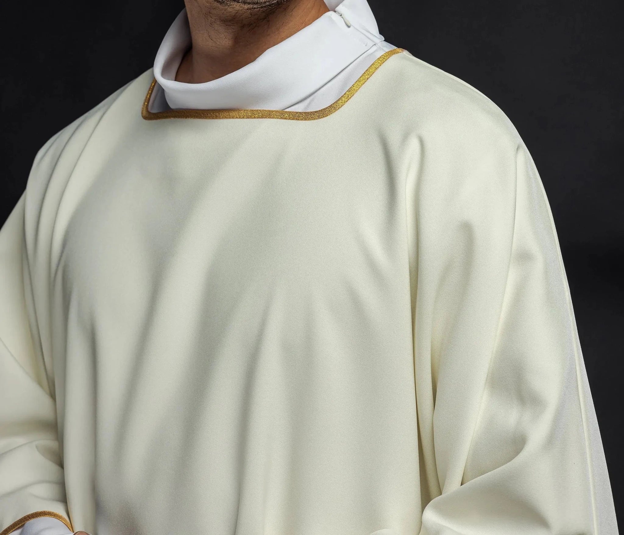 Smooth dalmatics with gold trim ecru