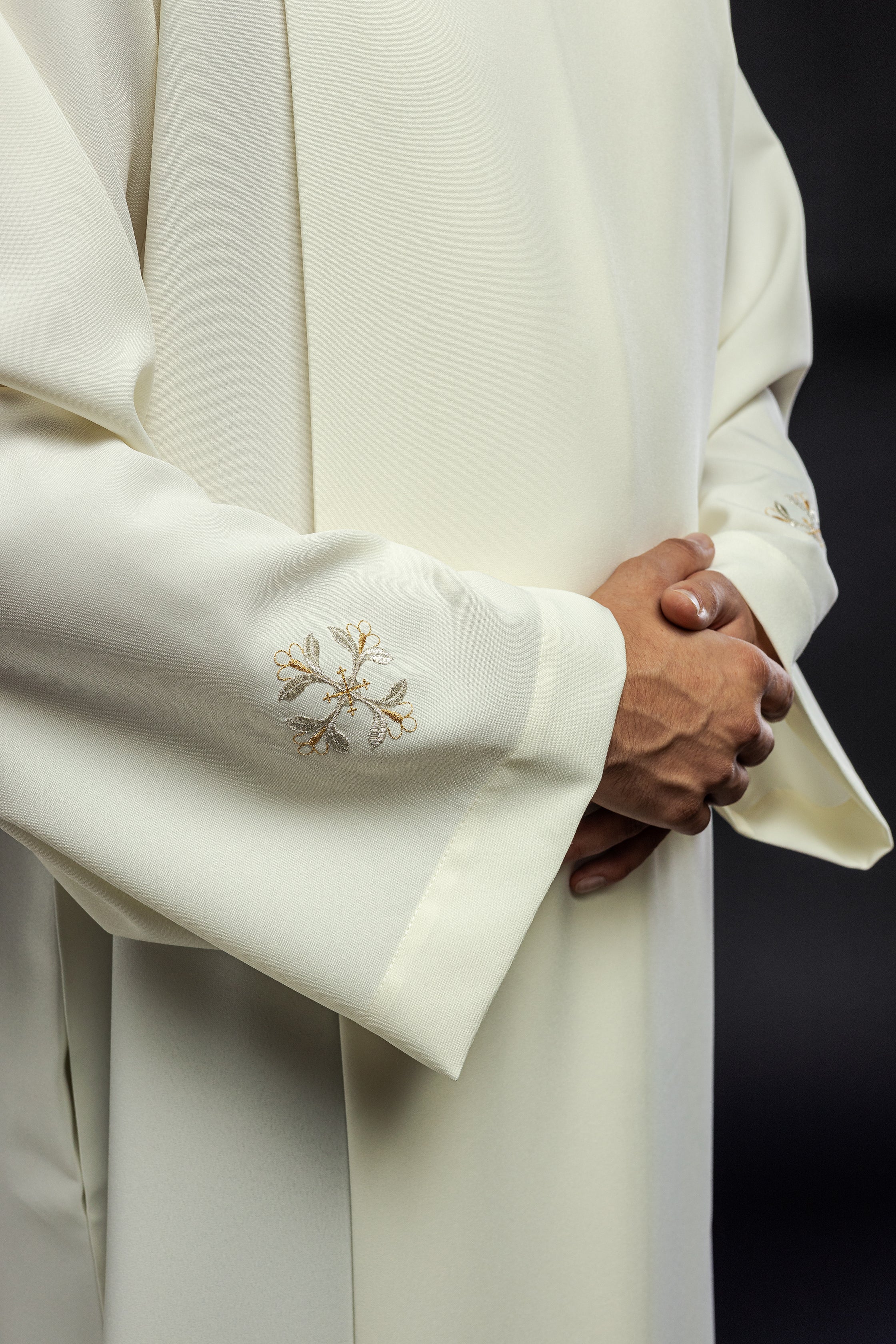 Turtleneck priest's robe decorated with ecru embroidery