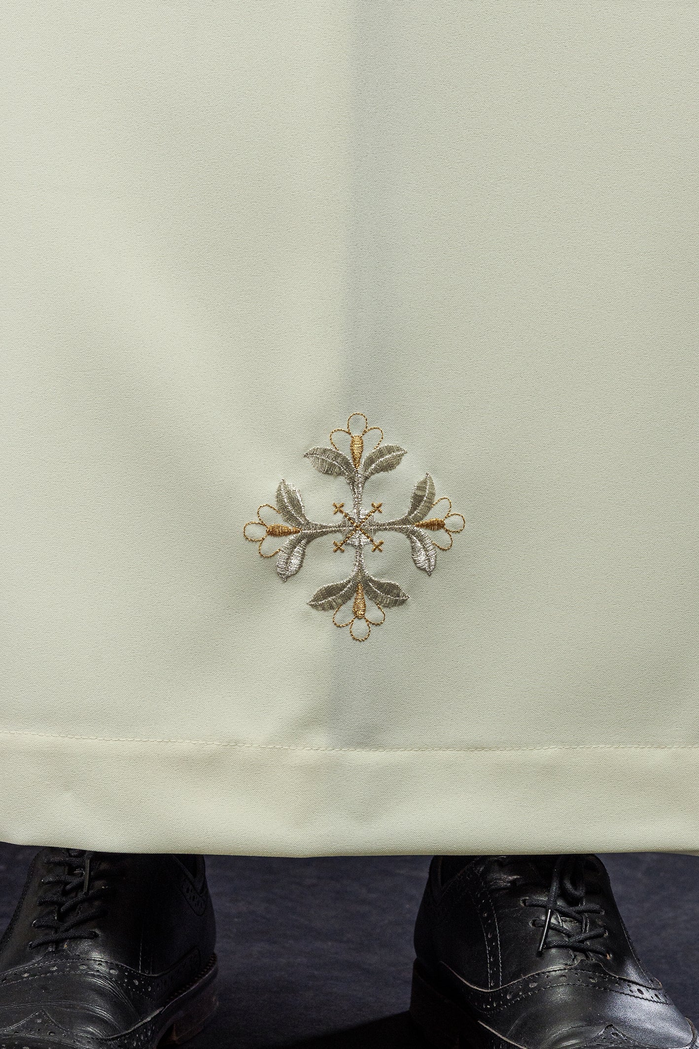 Turtleneck priest's robe decorated with ecru embroidery