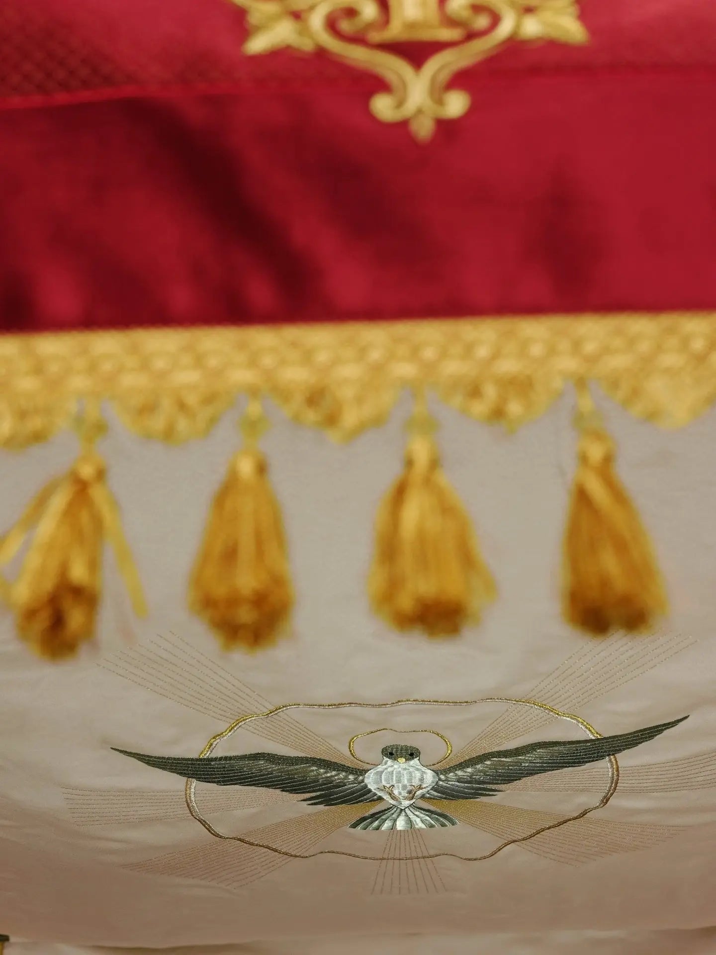 Embroidered canopy on burgundy velvet