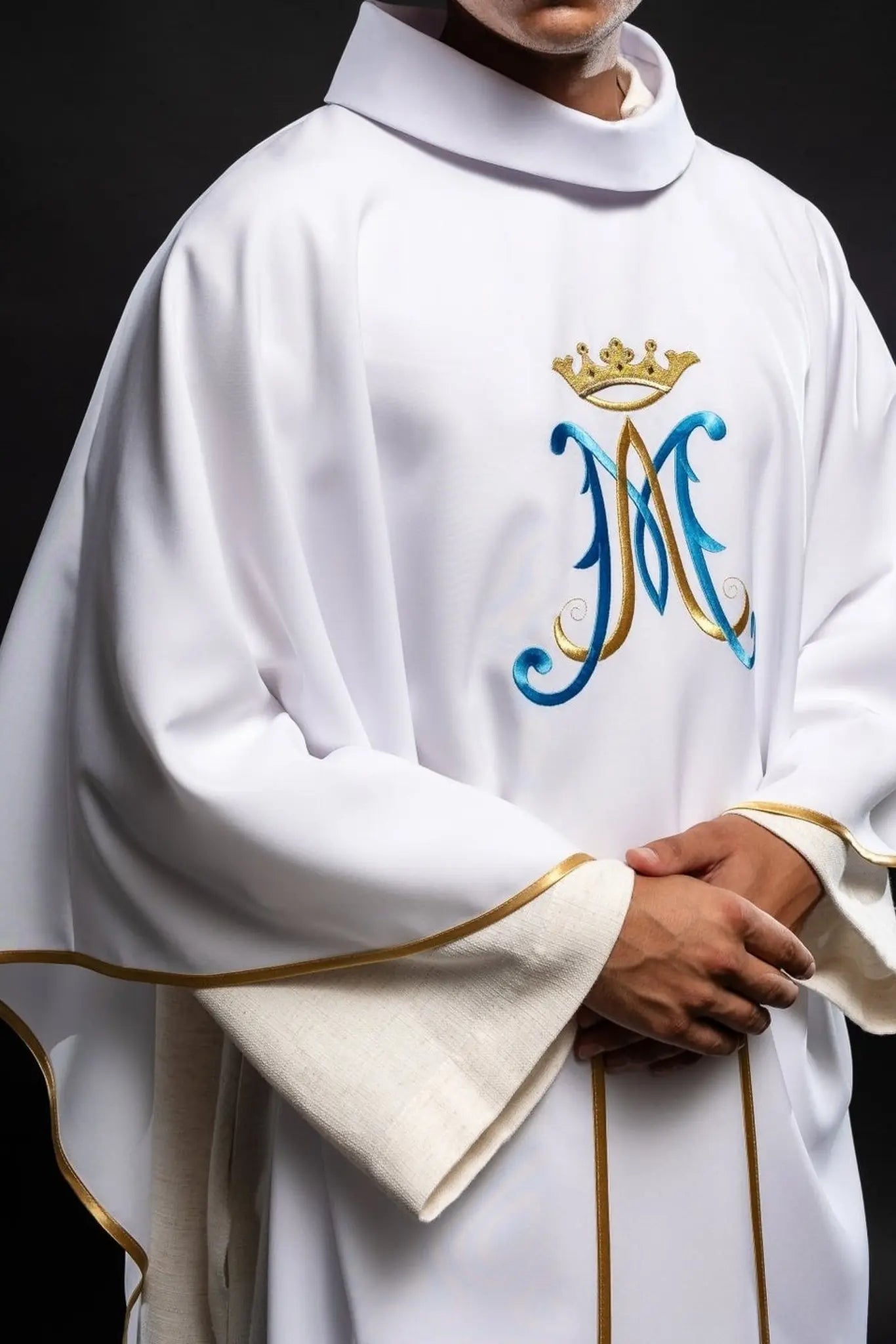 White chasuble embroidered with Marian motif