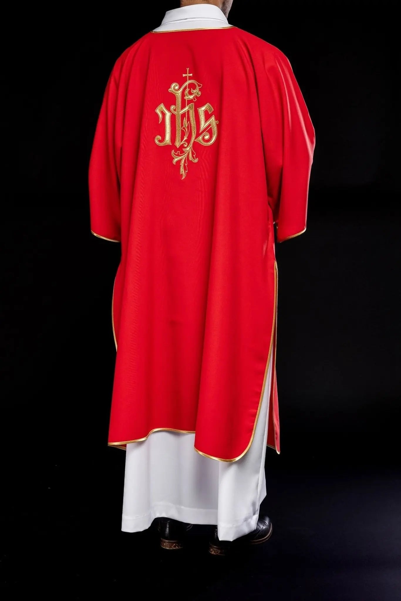 Red dalmatic with embroidered IHS design