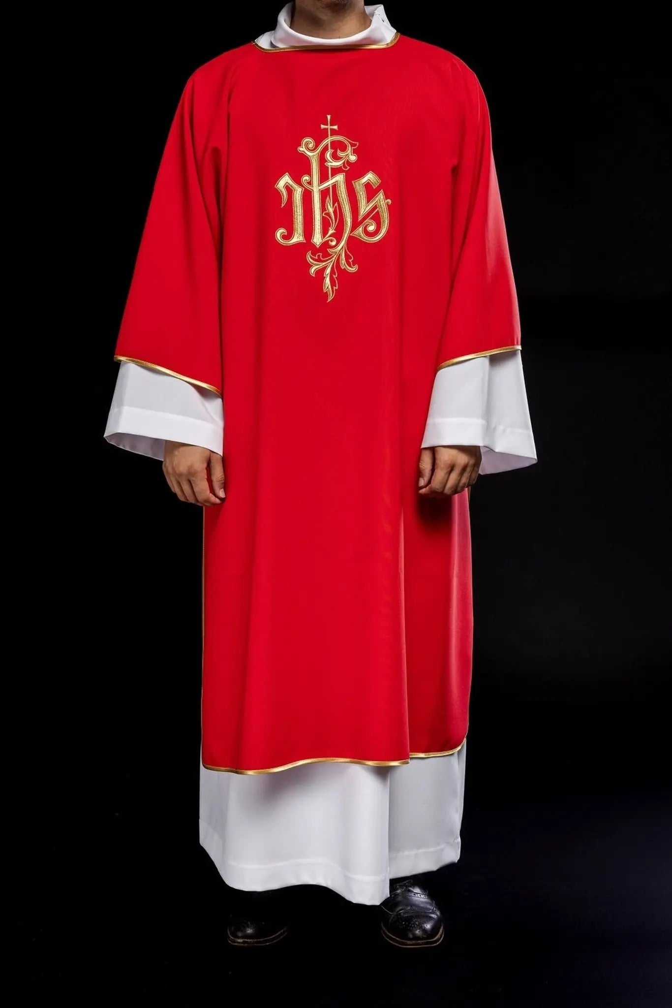 Red dalmatic with embroidered IHS design