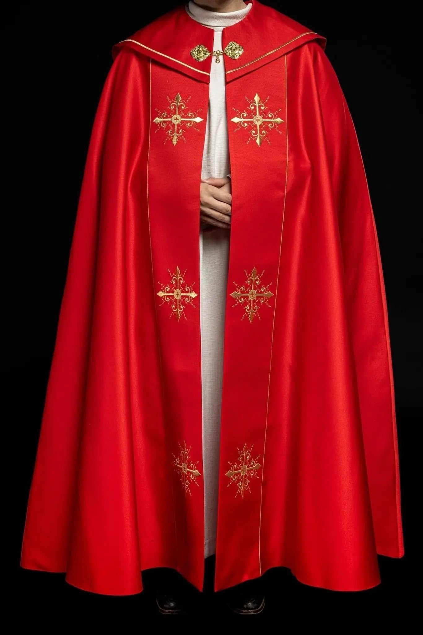 Red liturgical cope with gold crosses embroidery