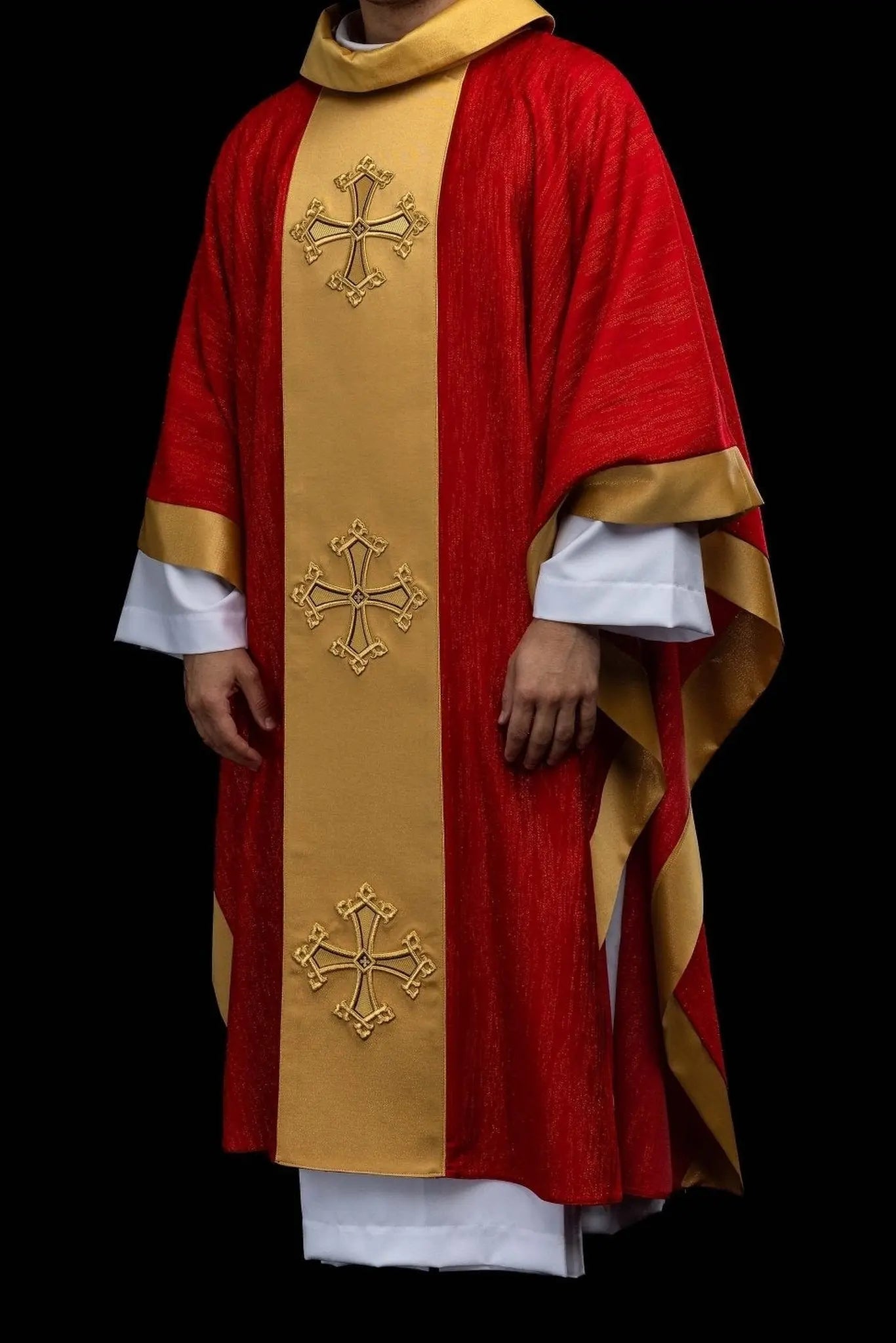 Red chasuble with embroidered cross motif and decorative gold band