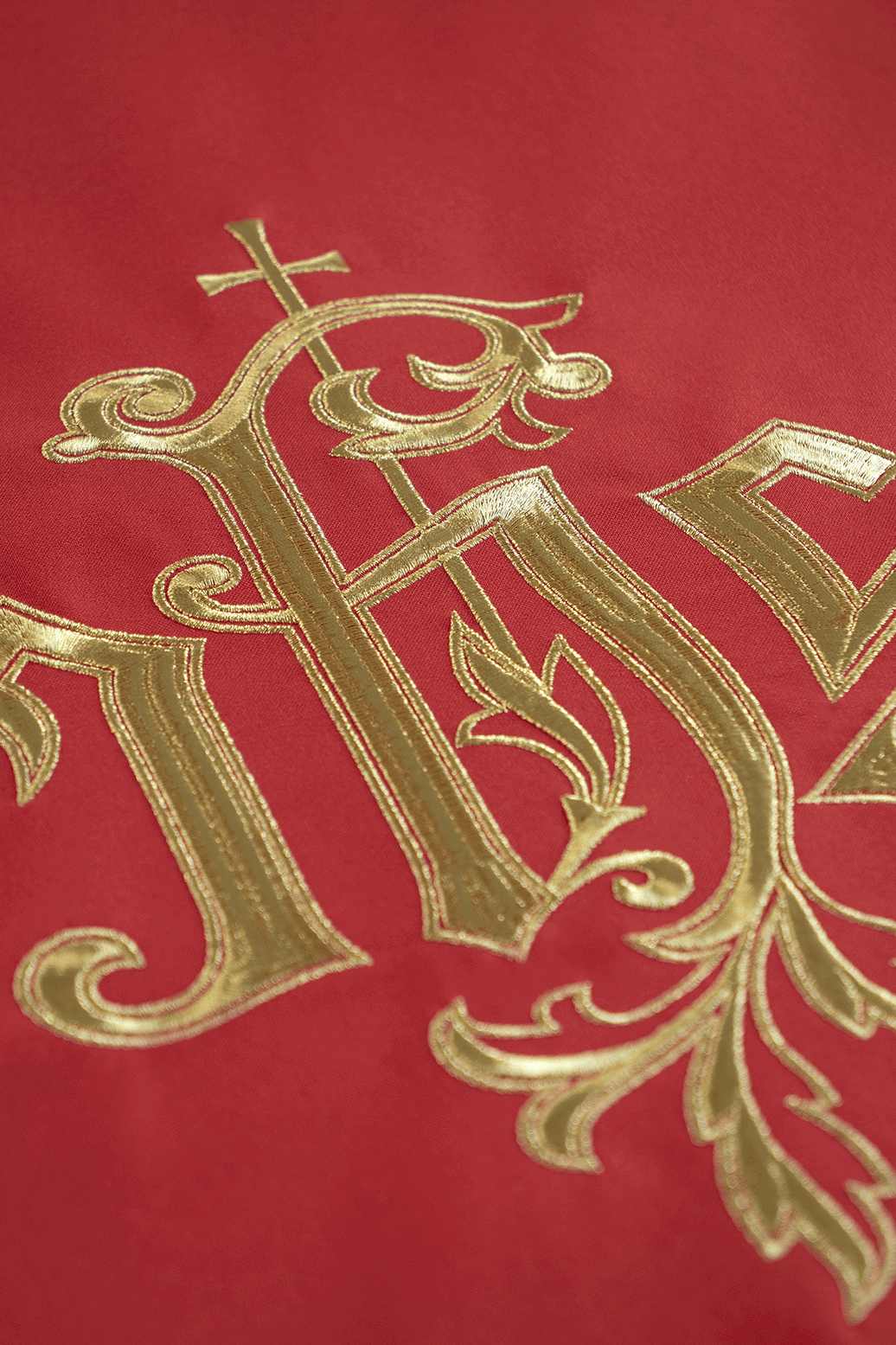 Red chasuble with gold IHS embroidery