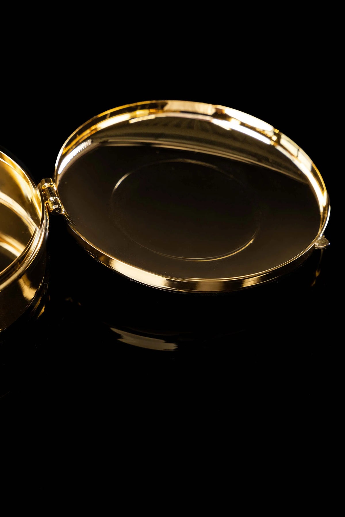 Gold-plated ciborium with engraved IHS, open lid view