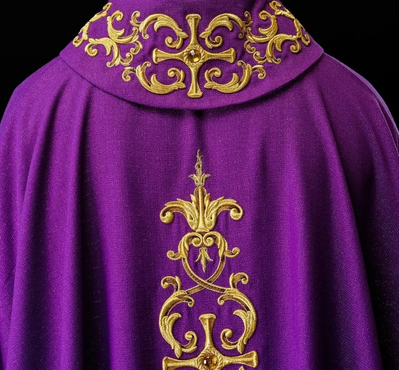 Purple chasuble richly embroidered with stones