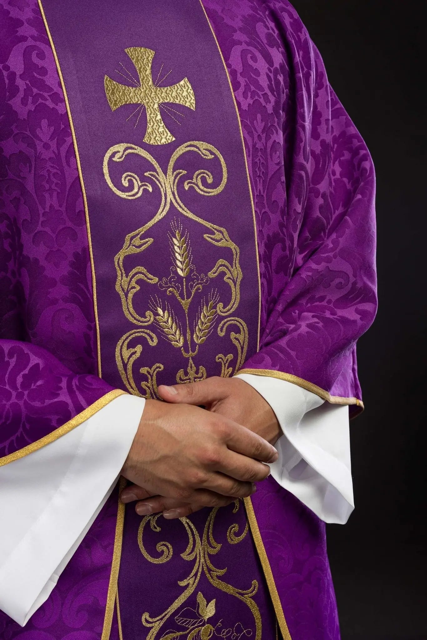 Purple liturgical chasuble decorated with embroidered belt