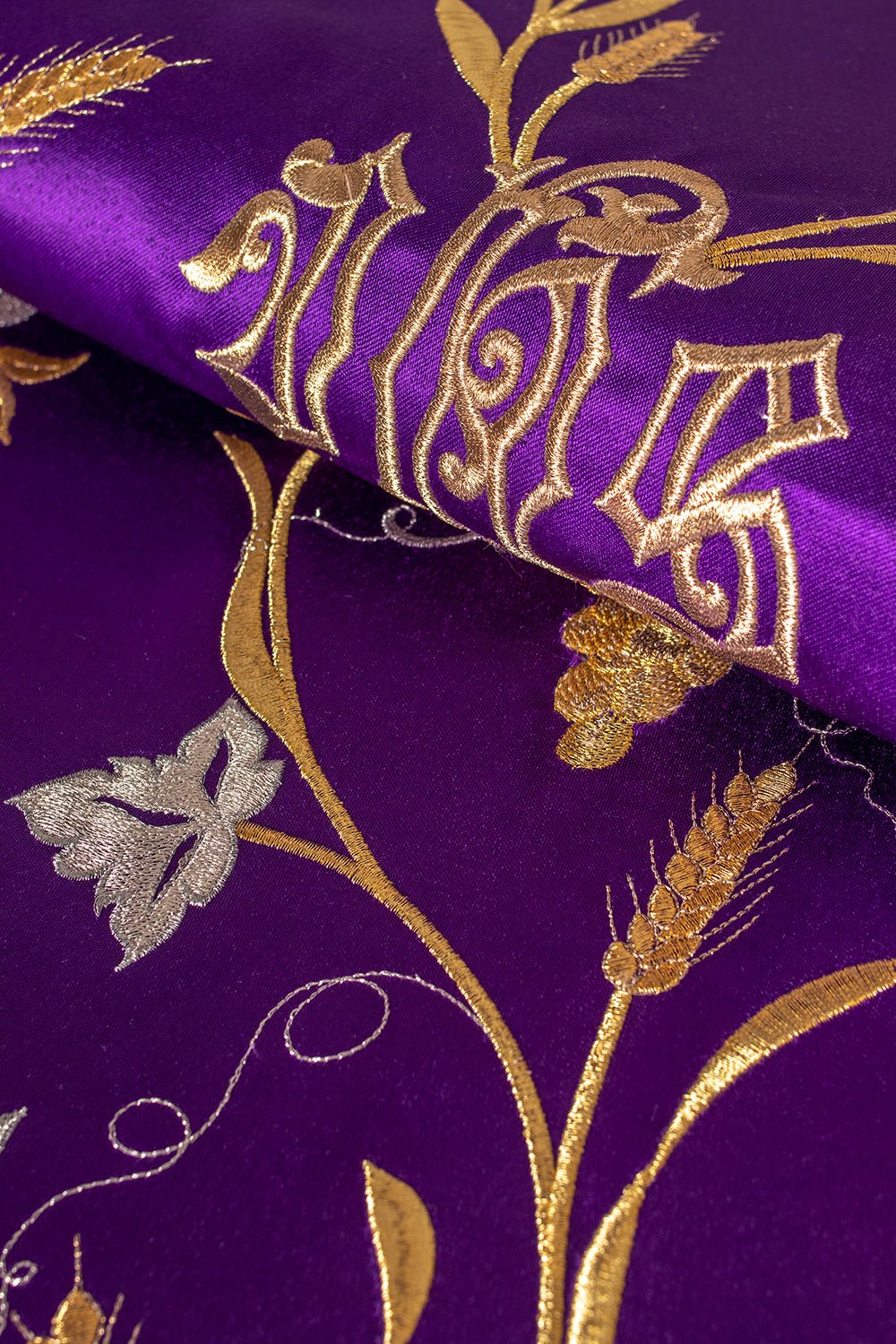 Purple Roman chasuble with motif of IHS, ears and grapes