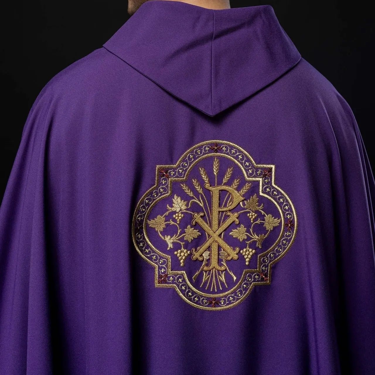 Purple chasuble with IHS and PAX embroidery