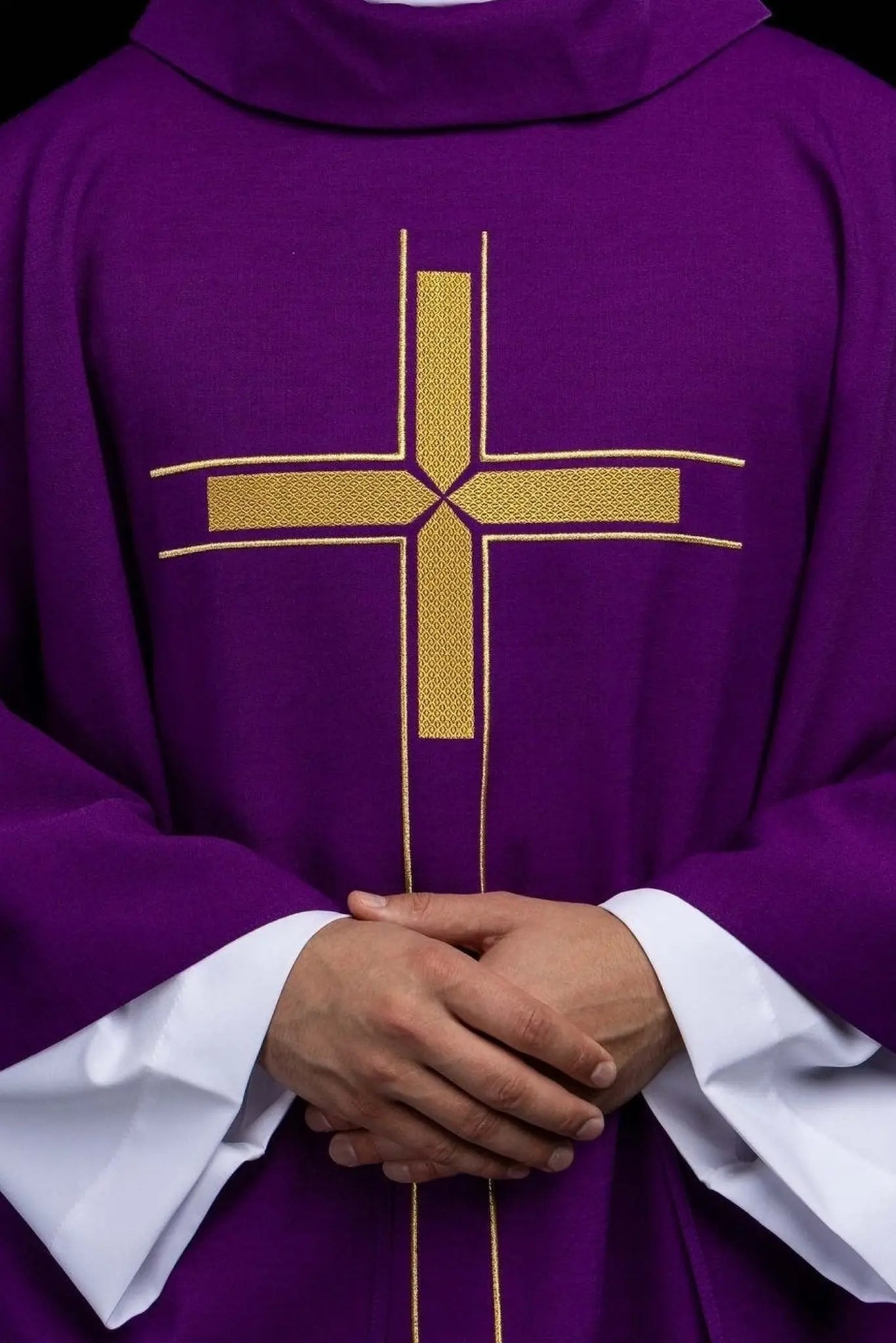 Purple chasuble with an embroidered cross motif