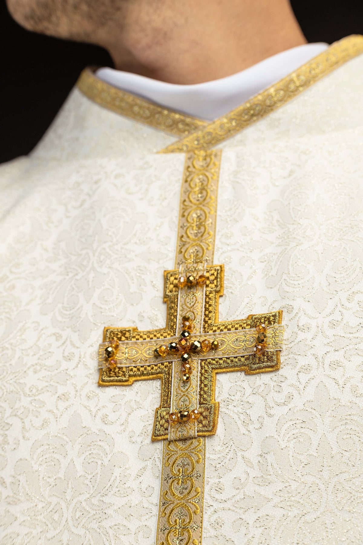 Ecru chasuble with dimensional crosses and natural stones, embroidered cross detail
