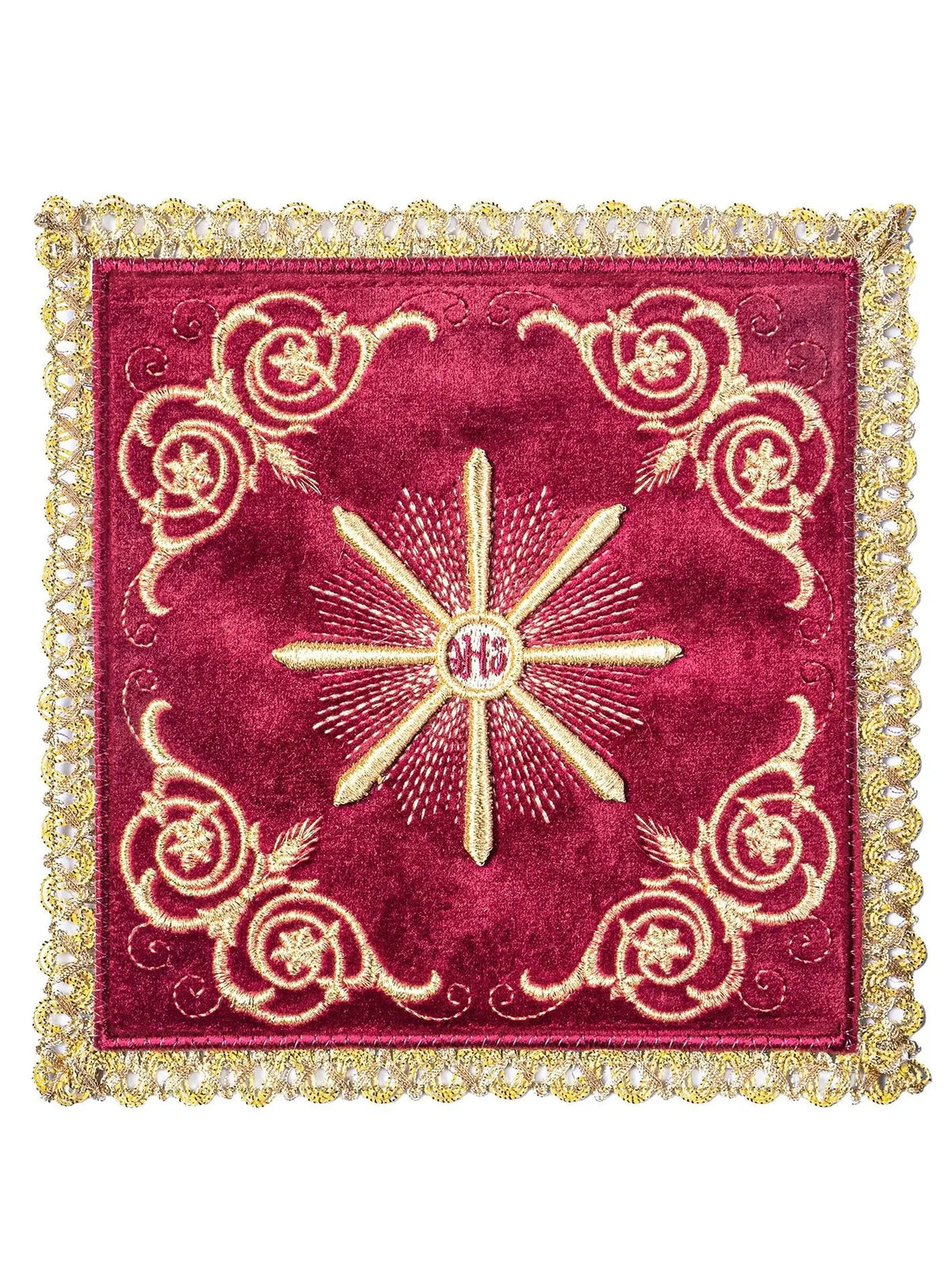 Red velvet altar linen with embroidered Eucharistic motif, top view