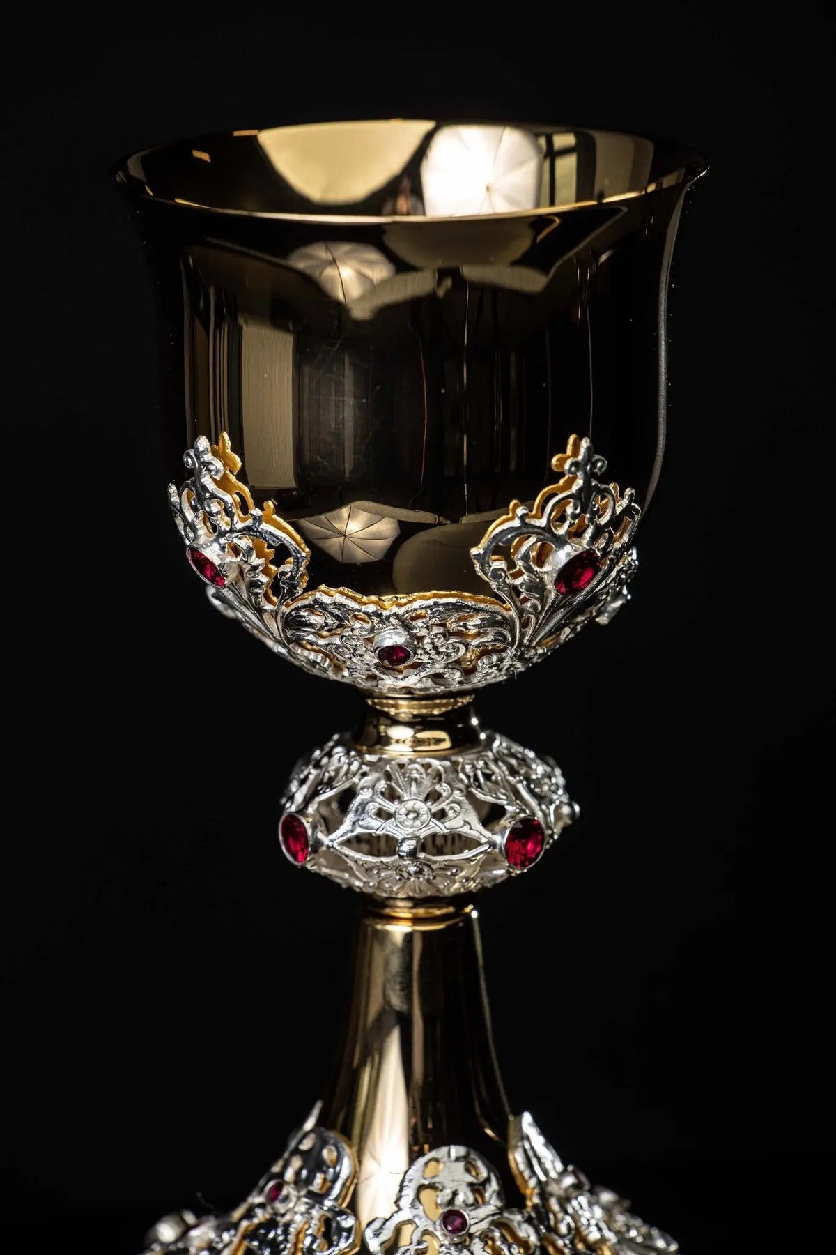 Gold chalice with openwork plant ornaments and rubies, cup close-up