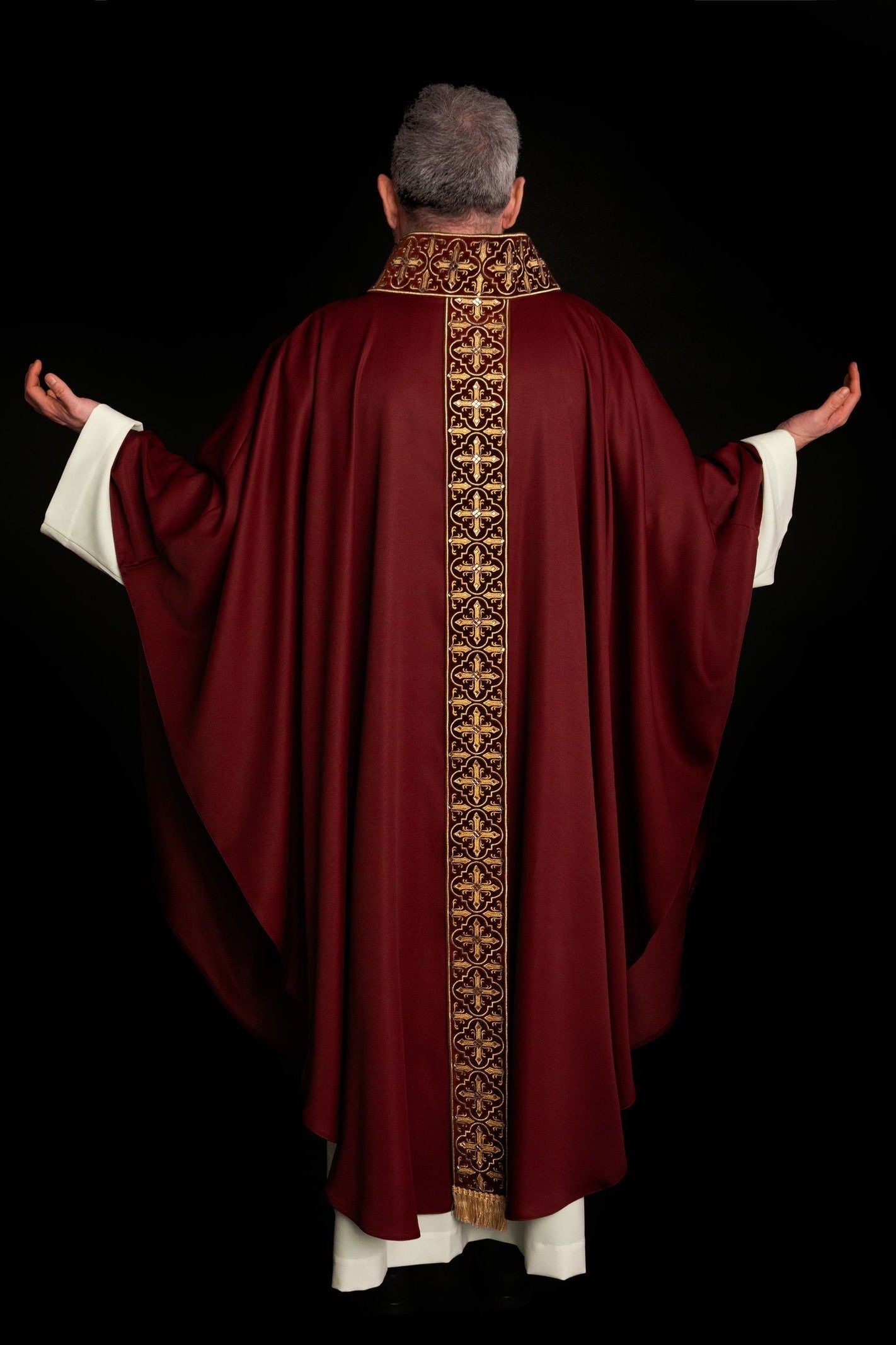 Chasuble richly embroidered decorated with red stones