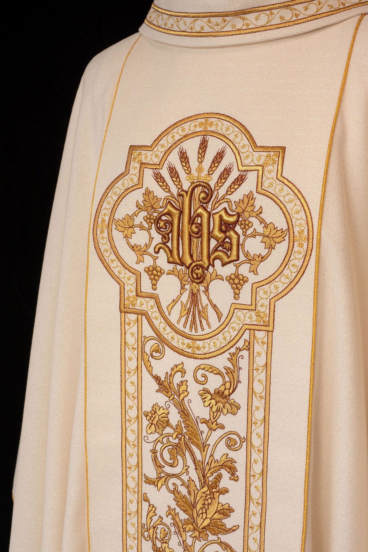 Ecru chasuble richly decorated with IHS motif