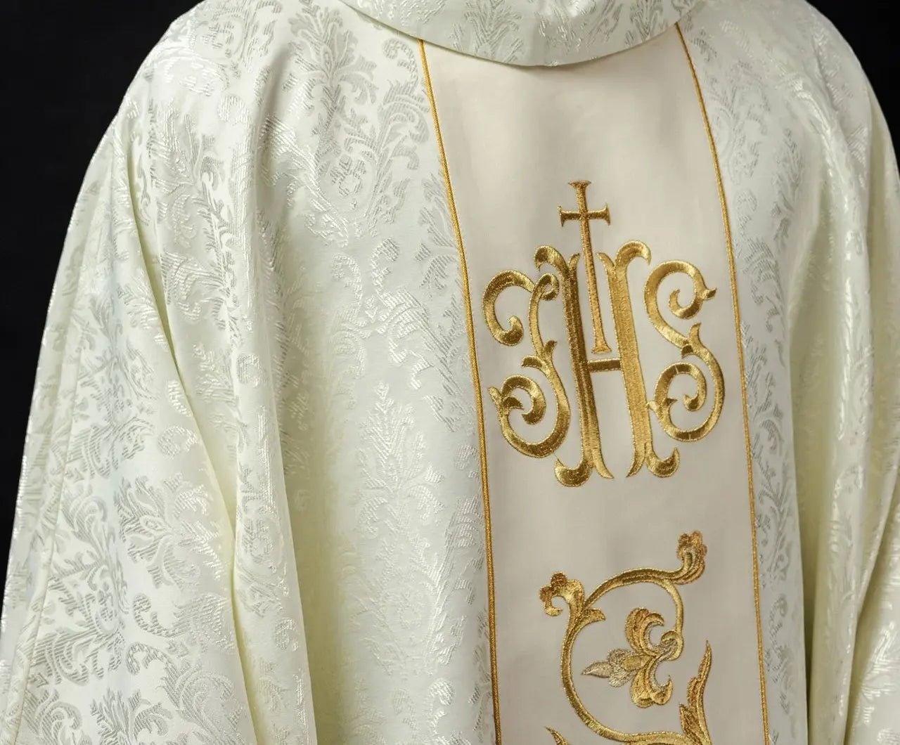 Ecru liturgical chasuble with richly decorated IHS belt