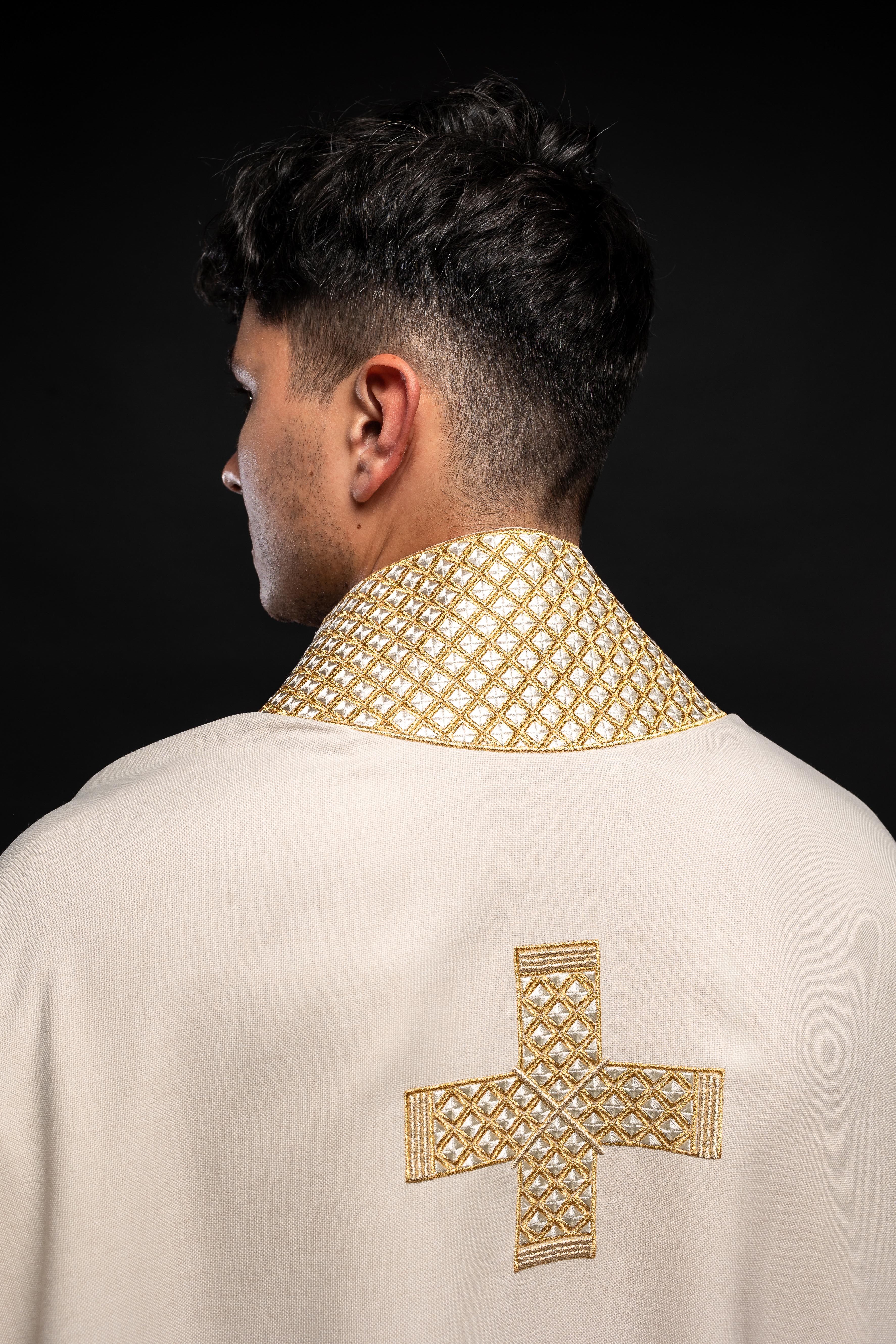 Chasuble in ecru color with embroidered crosses and collar